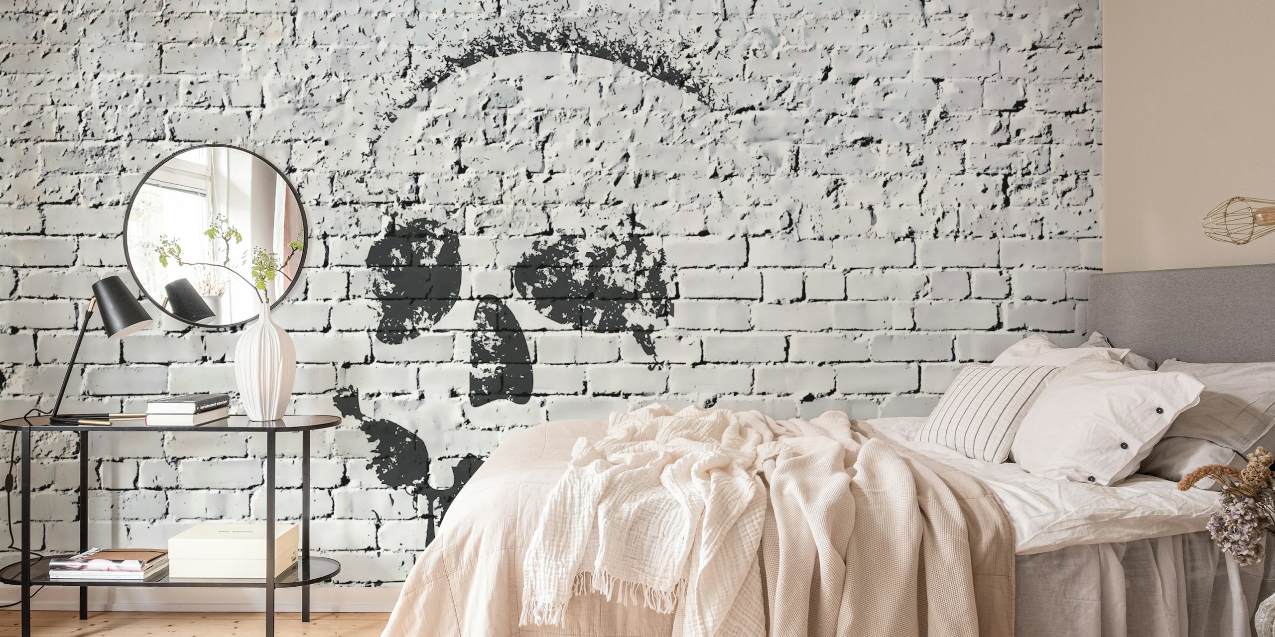 Zwart-witte skull design op een bakstenen muur wallpaper