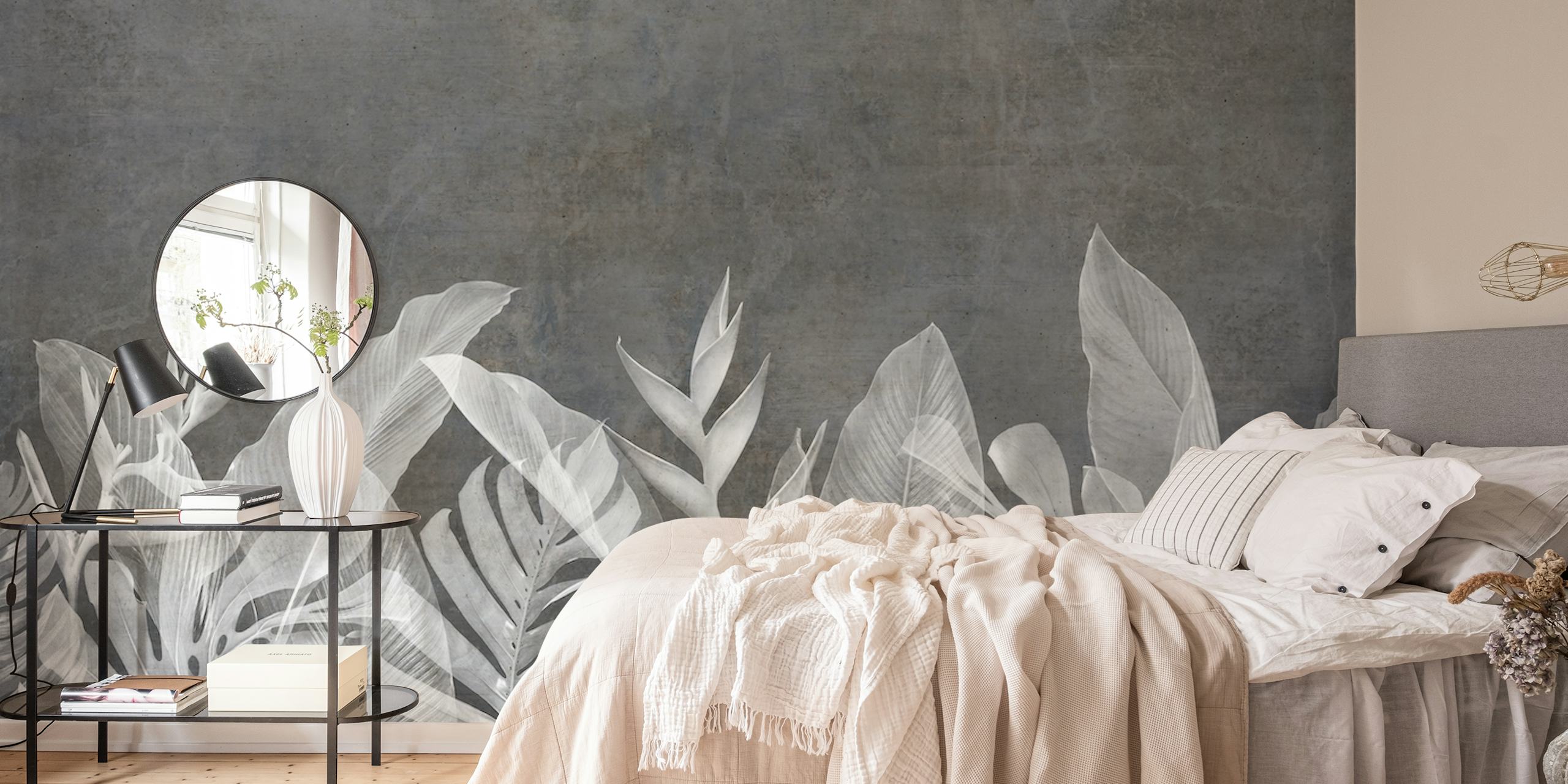 White tropical leaves against dark concrete background wallpaper