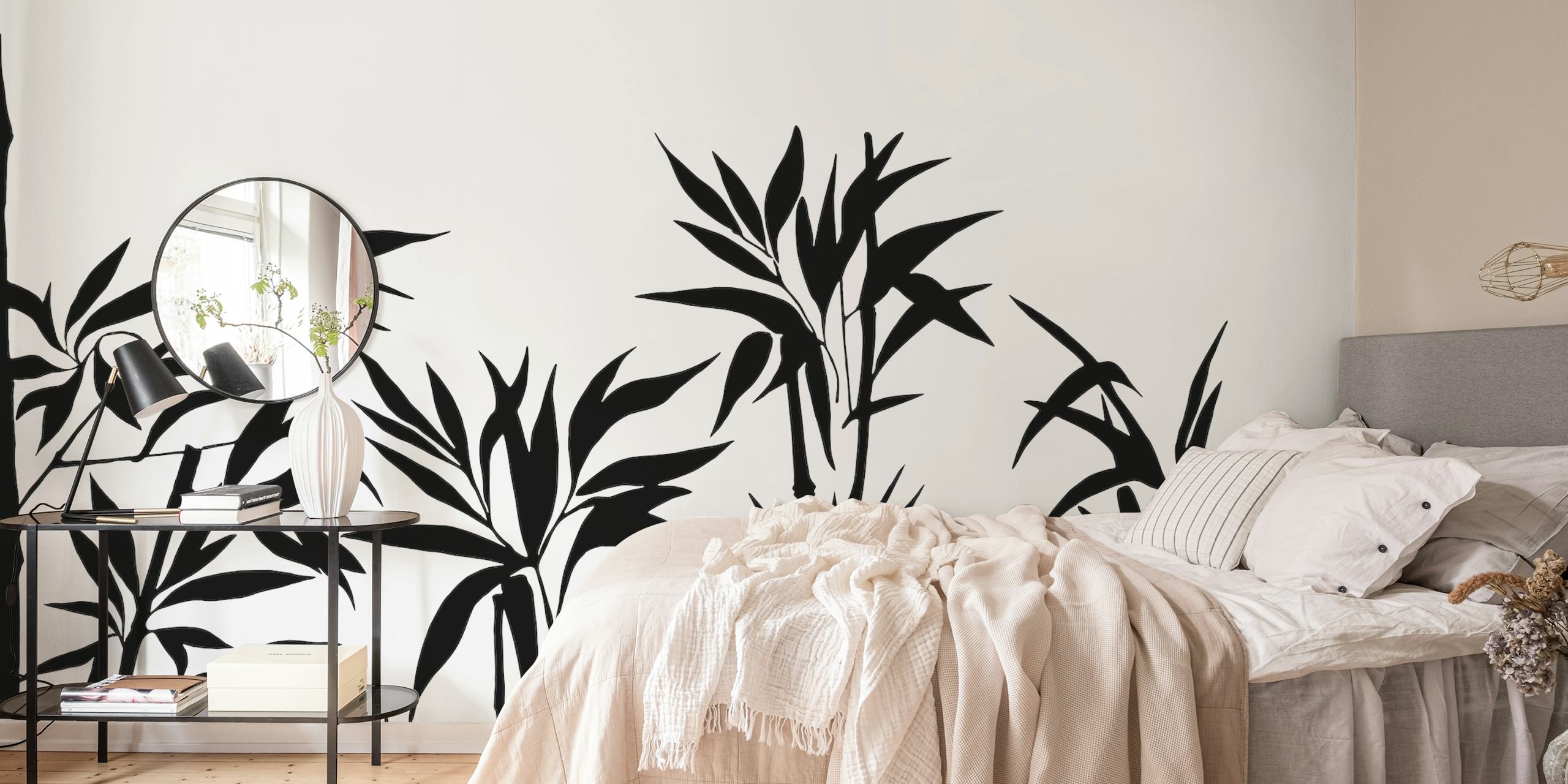 Black and white bamboo pattern wallpaper with lush leaves