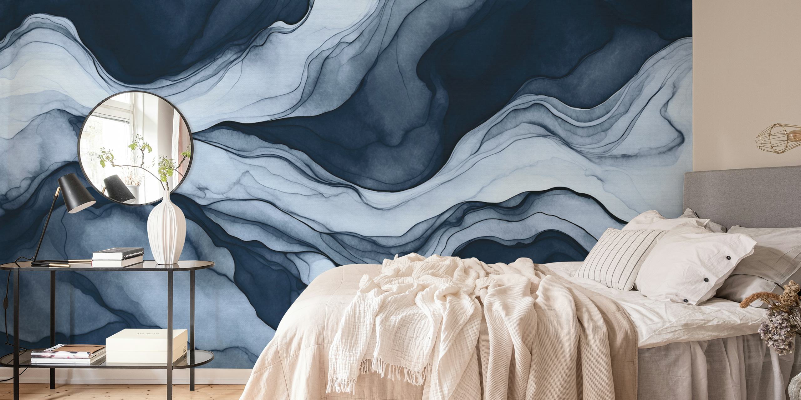 Abstract blue marble wallpaper with swirling lines in dark and light blue tones.