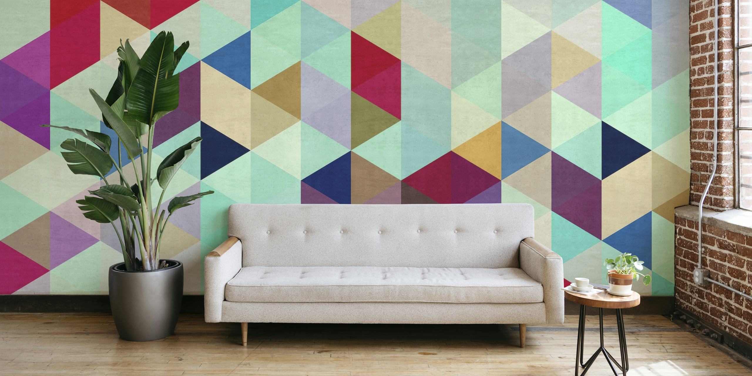 Vibrant wall mural of colored triangles in an interlocking pattern