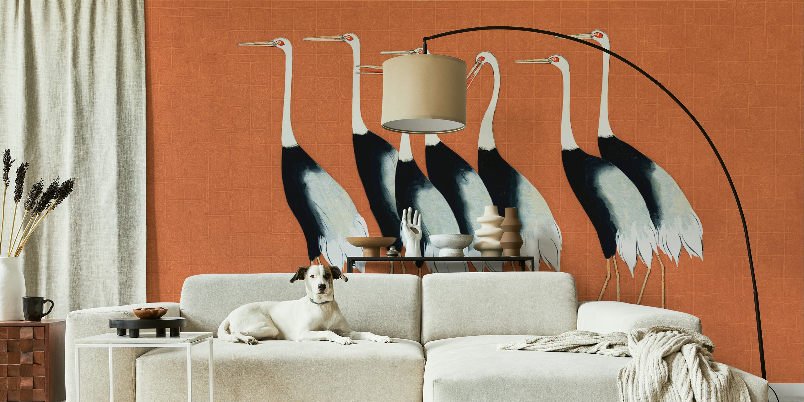 Graceful Japanese cranes standing against a warm terracotta background in modern wall mural design.
