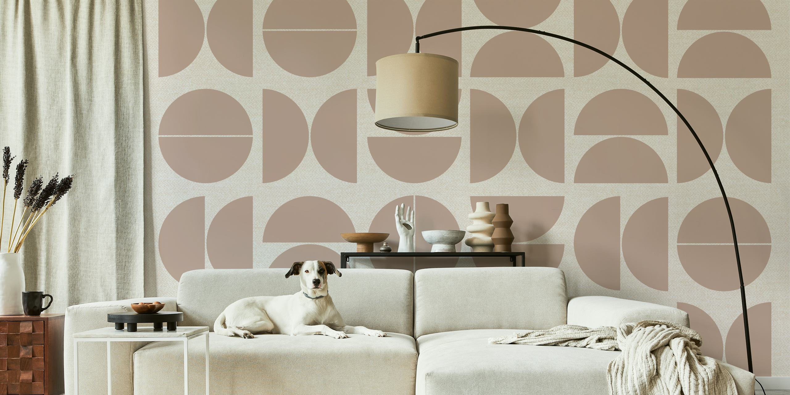 Geometric patterns in dusty pink and beige wallpaper