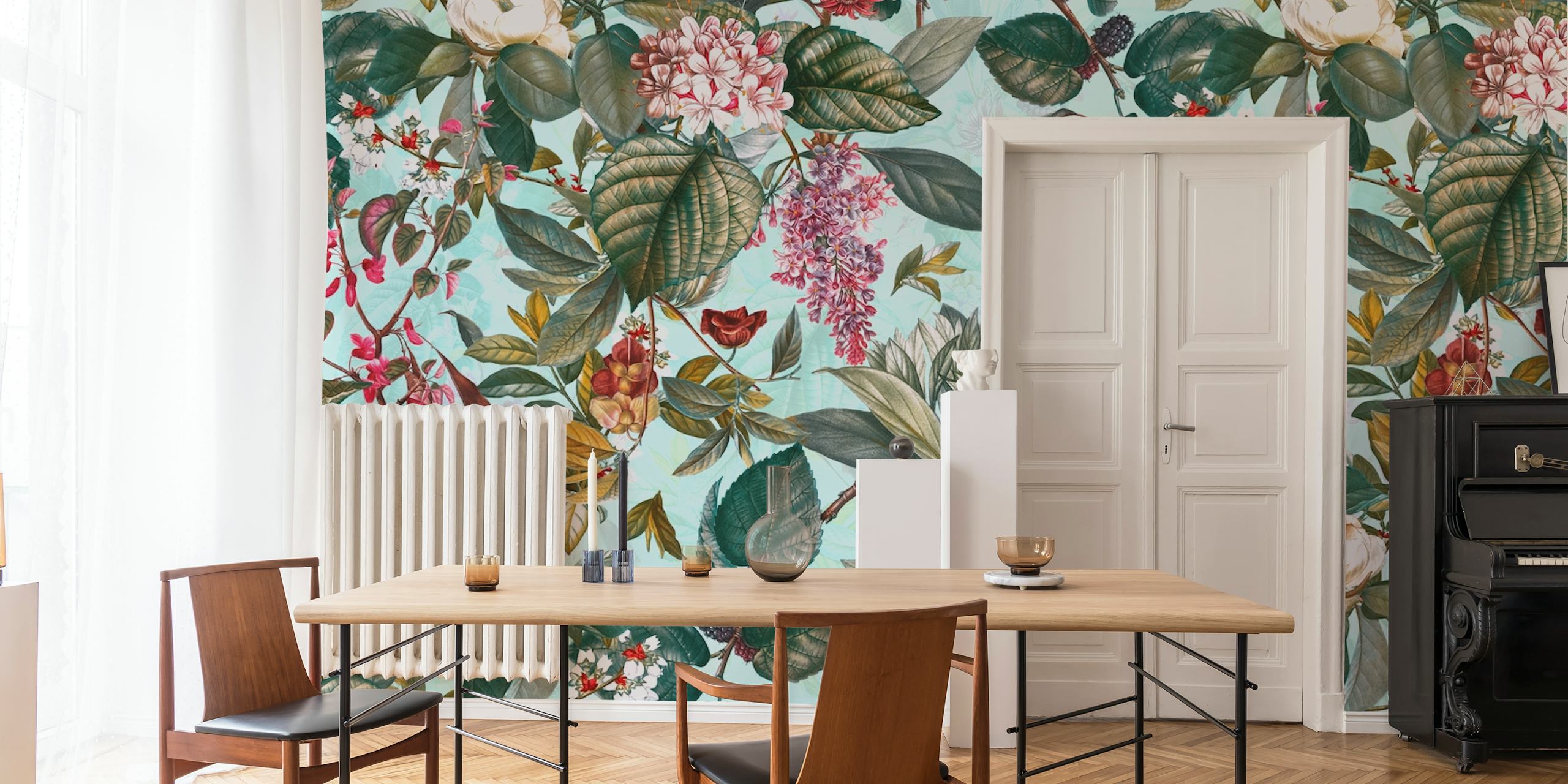 Colorful floral and leaf pattern in green, pink, and blue wallpaper.