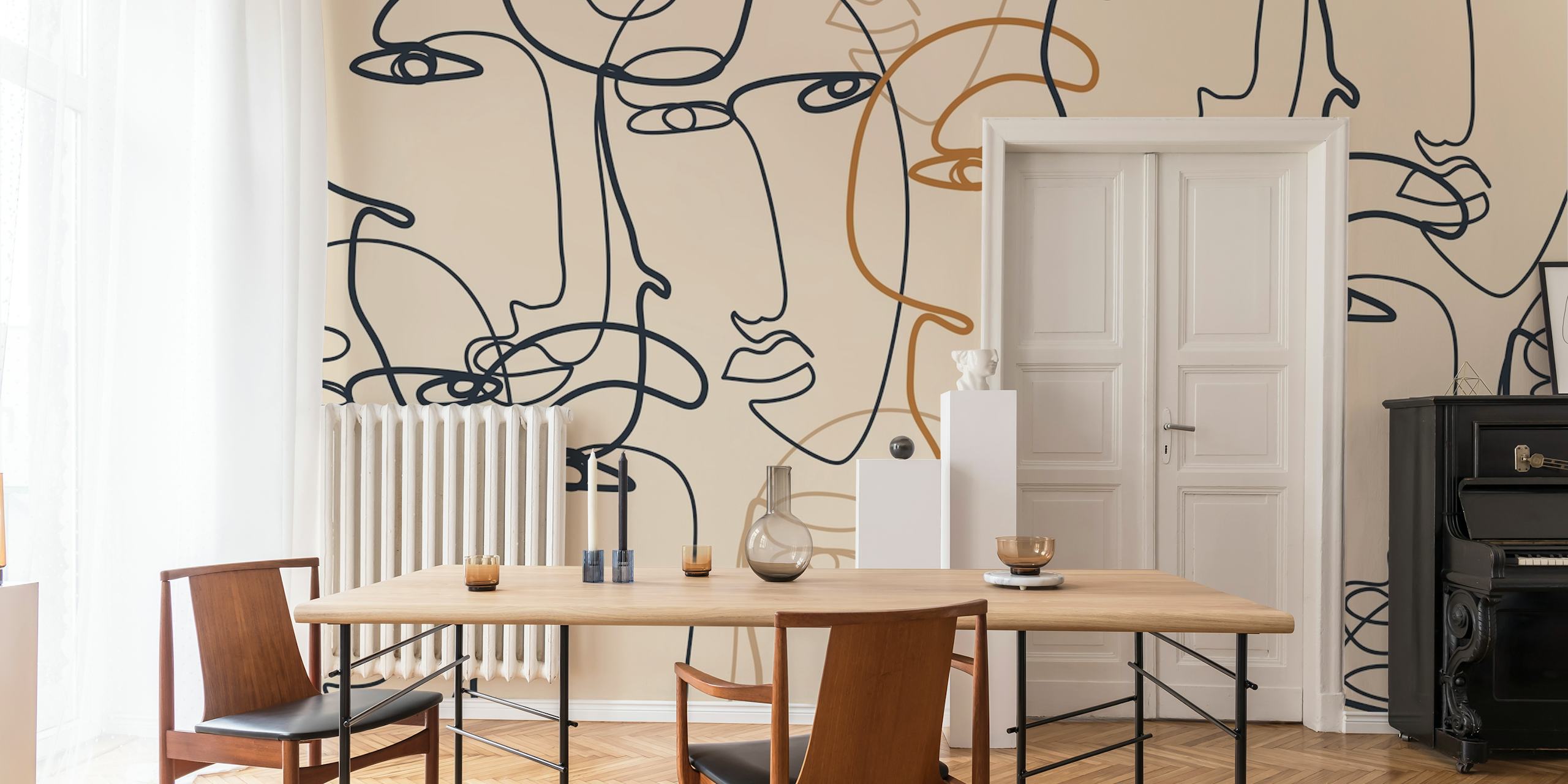 Continuous line art of faces in black, orange on beige wallpaper