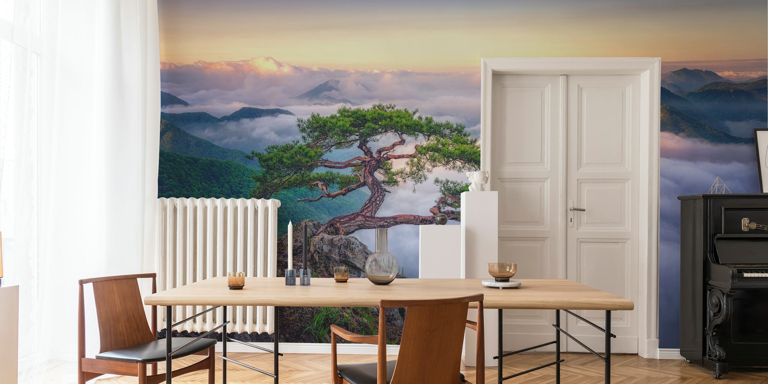 Wallpaper depicting a tree on rocky mountain peak