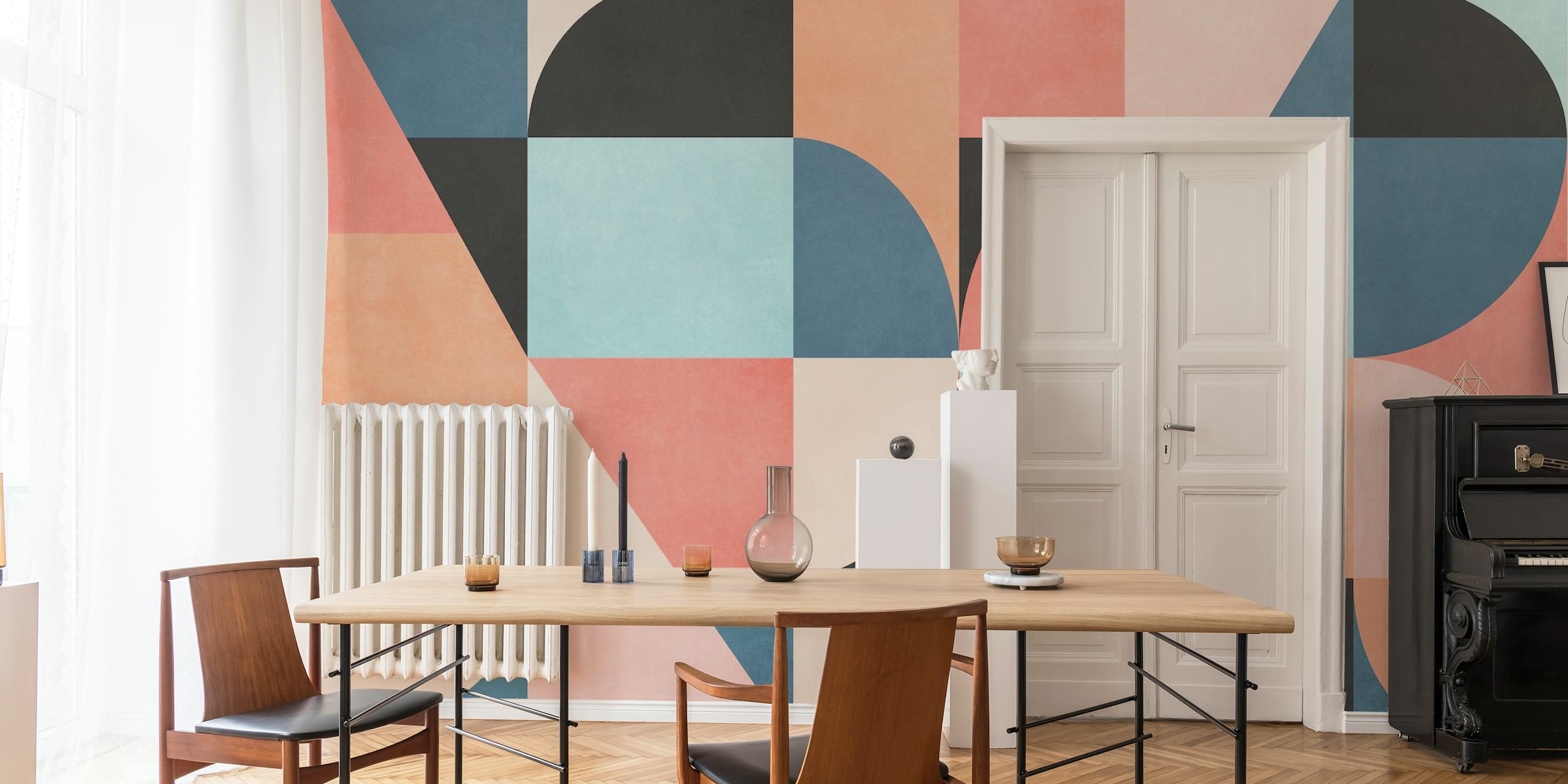 Pastel colored geometric shapes in pink, blue, and black wallpaper