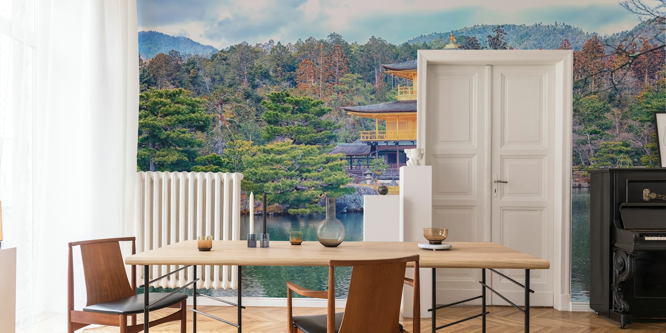 Japanese golden temple surrounded by trees and water wallpaper
