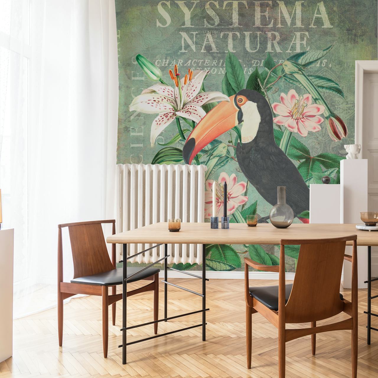 Toucan surrounded by pink flowers and green leaves wallpaper