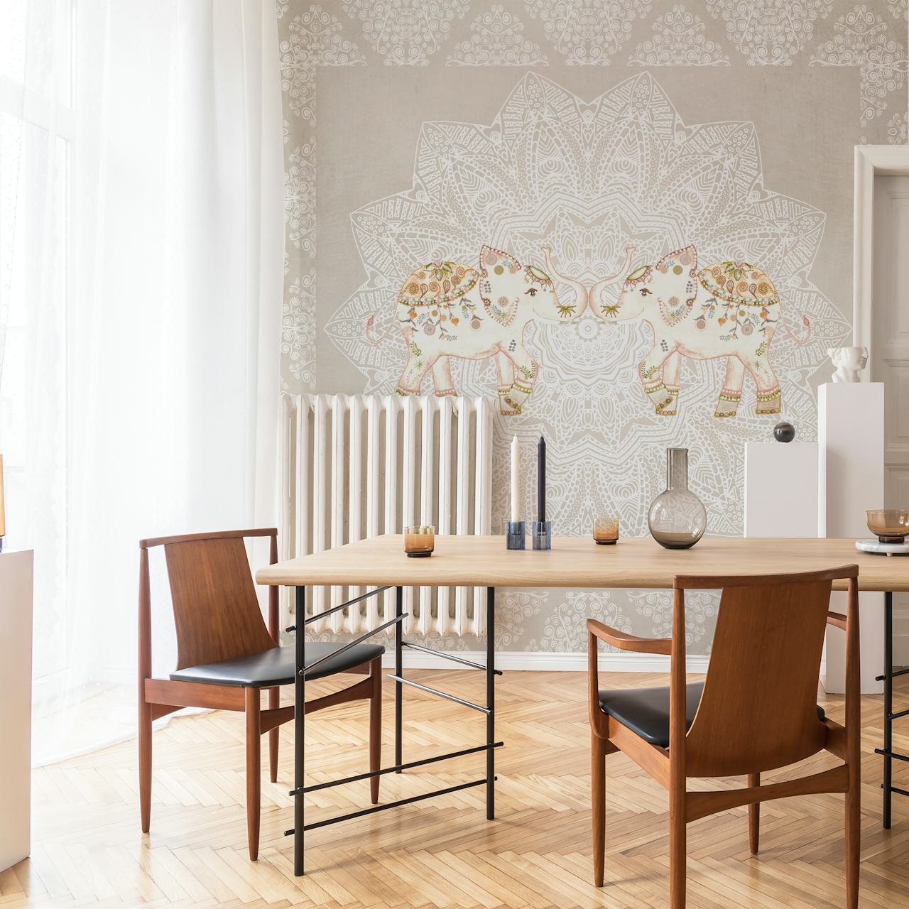 Two decorated elephants surrounded by a mandala pattern, soft gray wallpaper