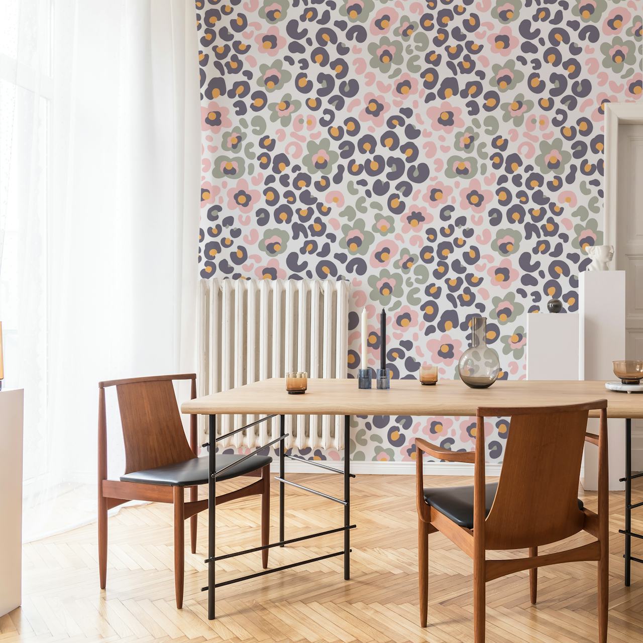 Floral animal print wallpaper in pastel colors featuring pink, grey and navy elements.