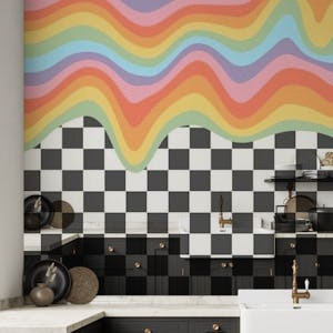 Rainbow on checkered wall