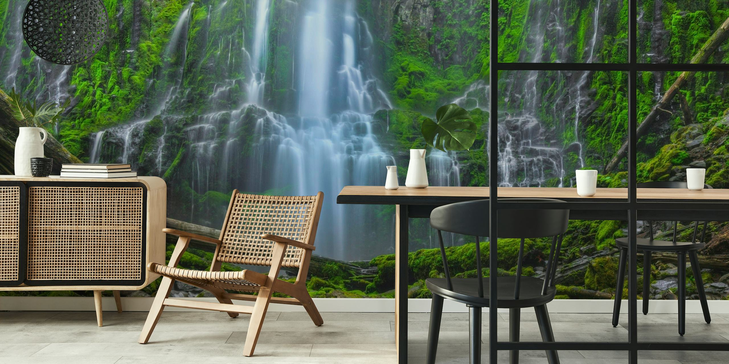 Lush waterfall in a green forest wall mural
