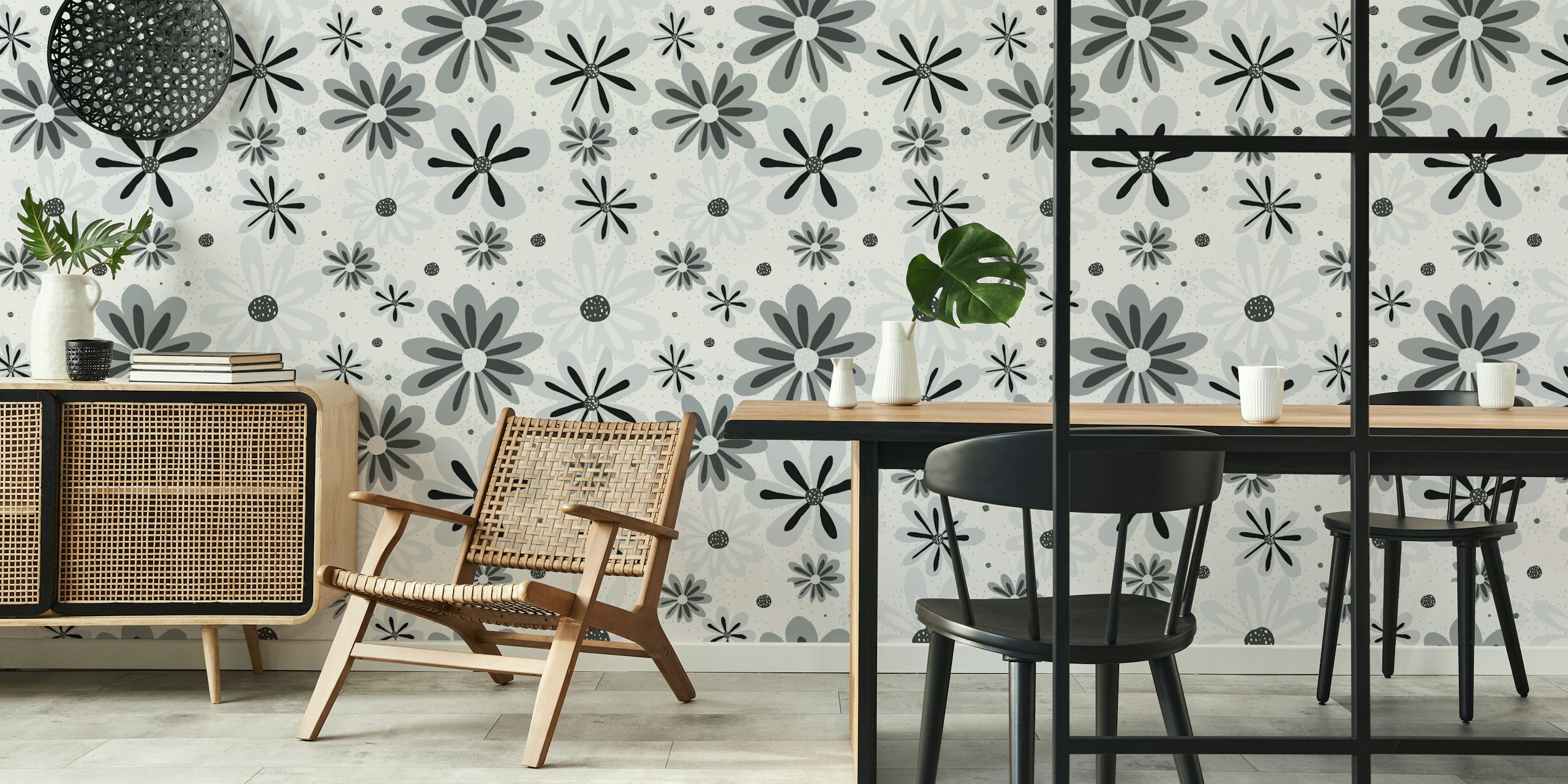 Black and white floral pattern wallpaper featuring assorted flower shapes and styles