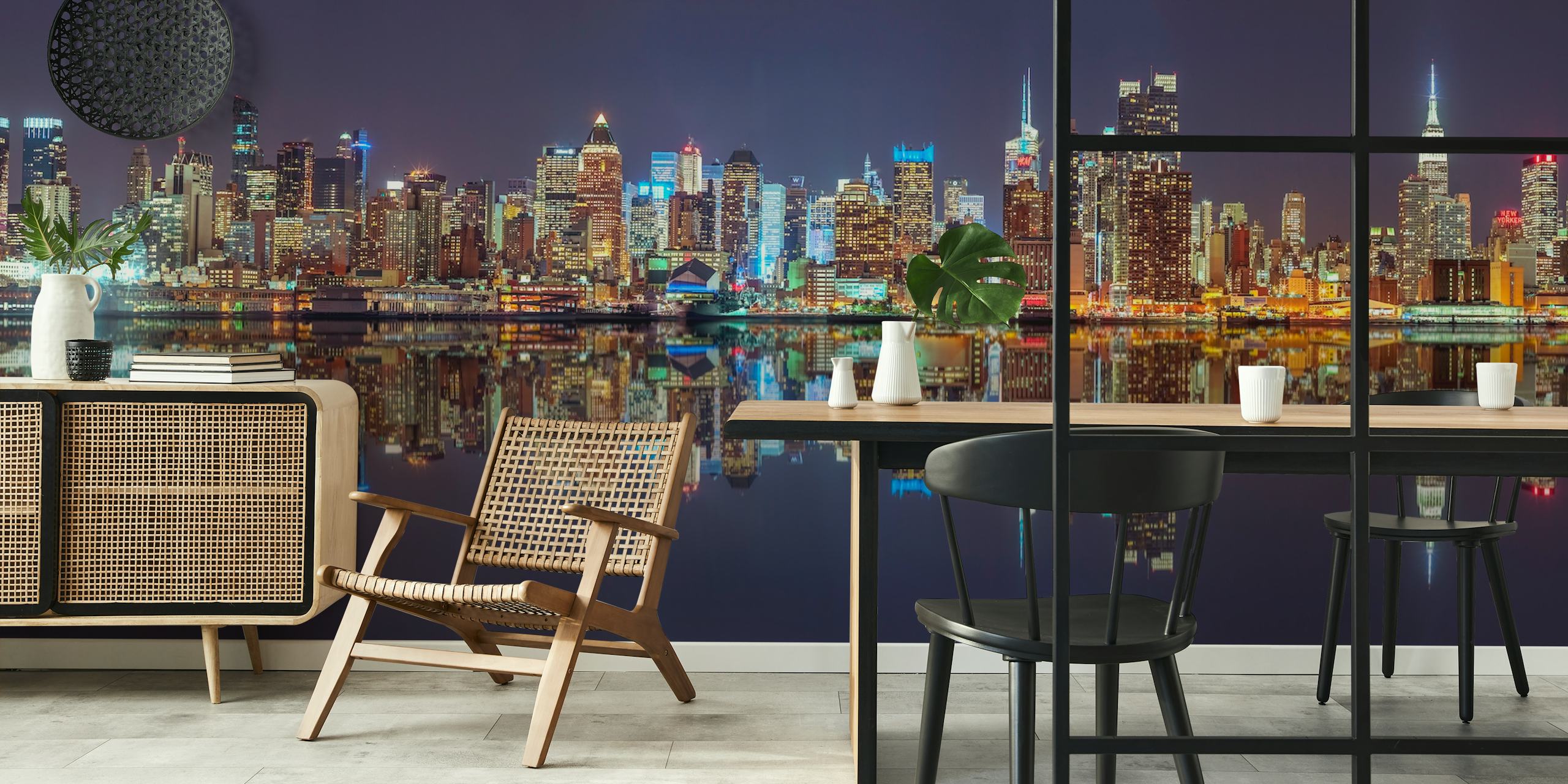 City skyline at night with bright lights reflecting on water wallpaper