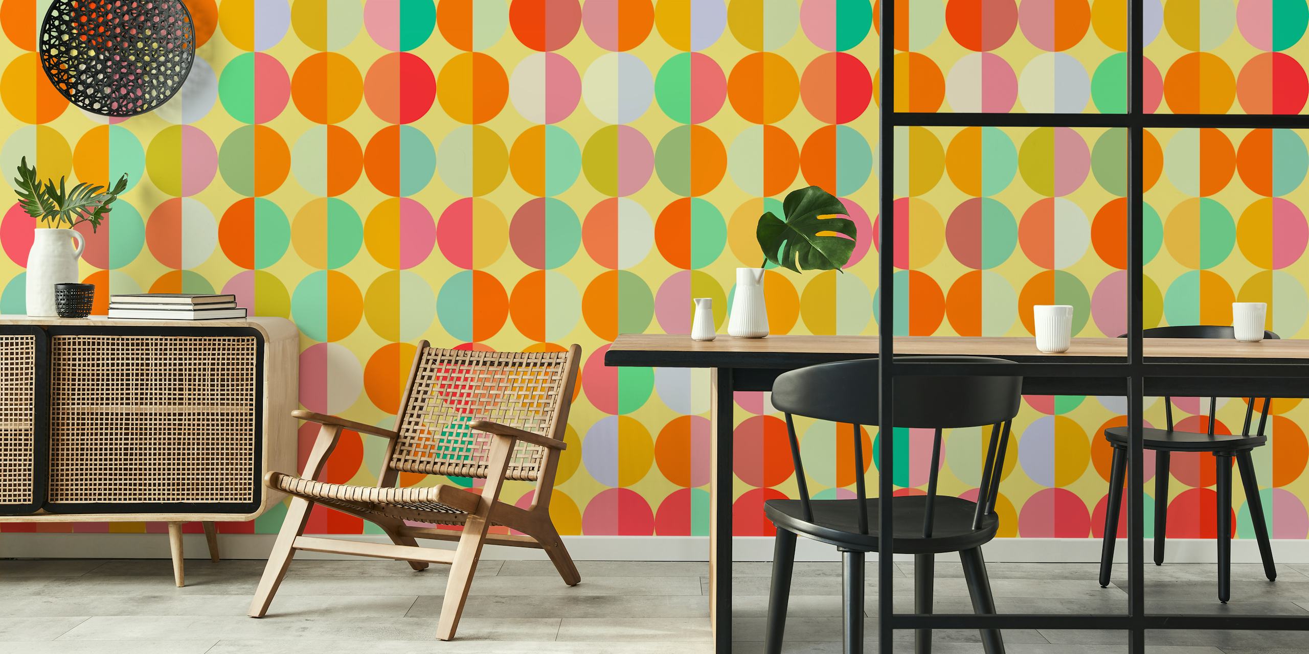 Colorful geometric circles in pink, orange, yellow, and teal wallpaper