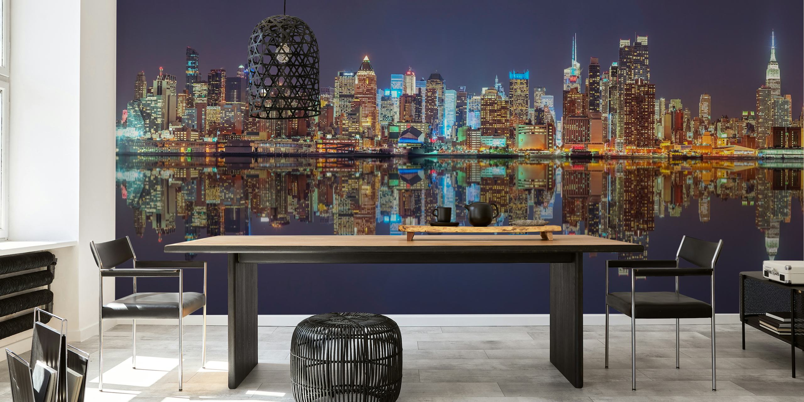City skyline at night with bright lights reflecting on water wallpaper