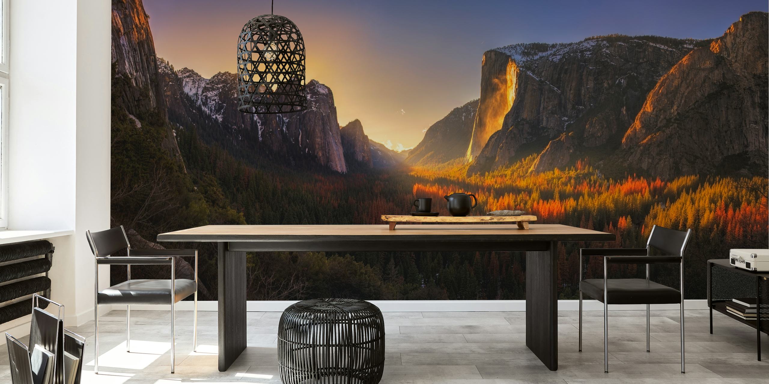 A vivid sunset over Yosemite's Firefall, showcasing red, orange, and gold tones against majestic mountains. Nature wallpaper