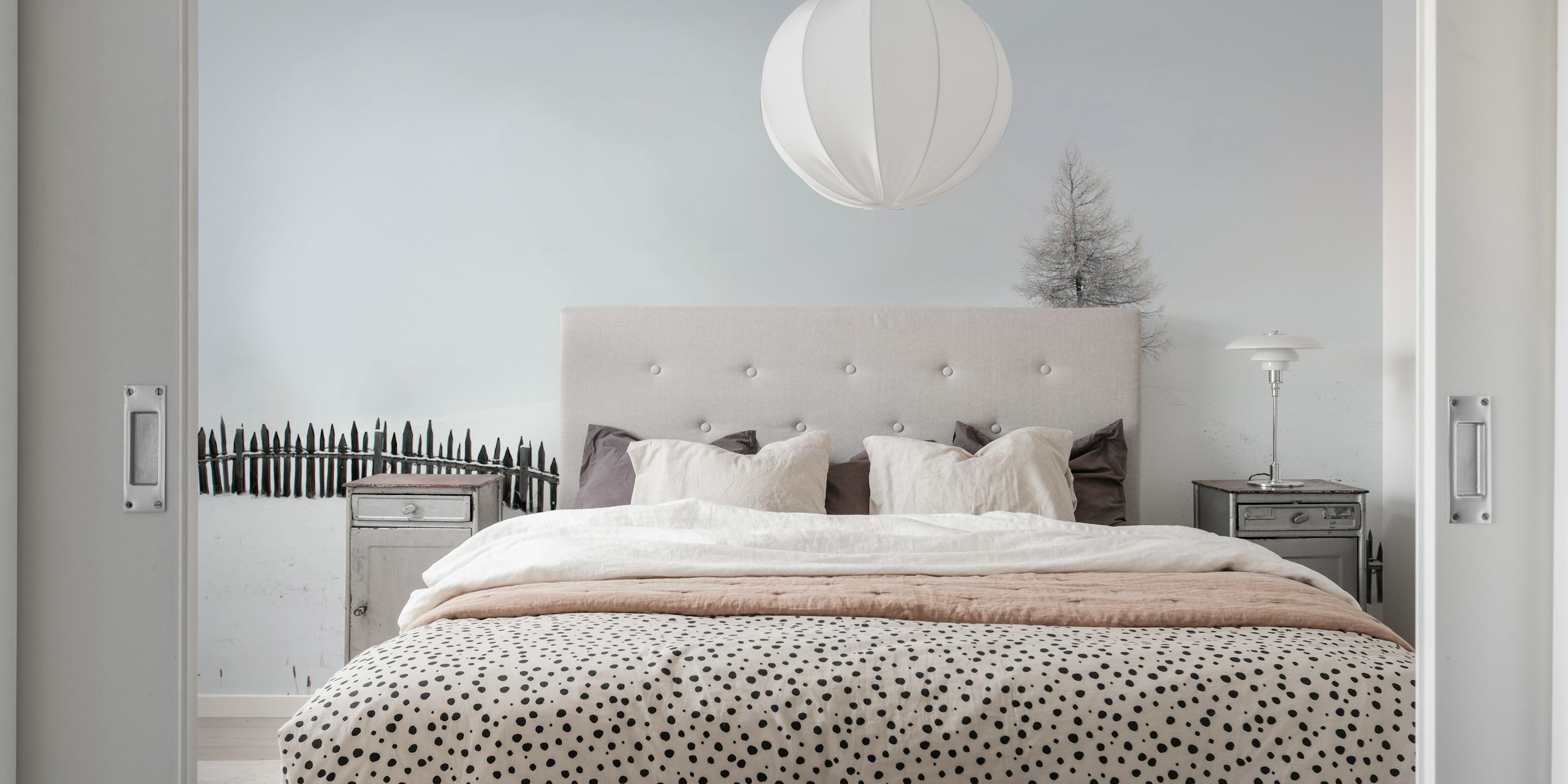 Minimalist snowy landscape with a lone tree and wooden fence wallpaper