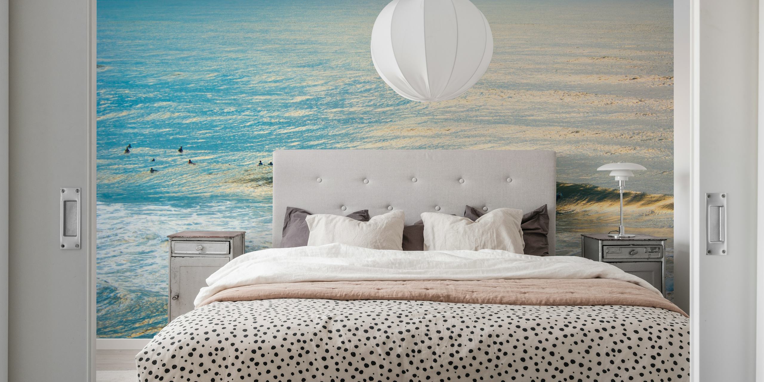 Ocean waves and surfers in blue tones wallpaper