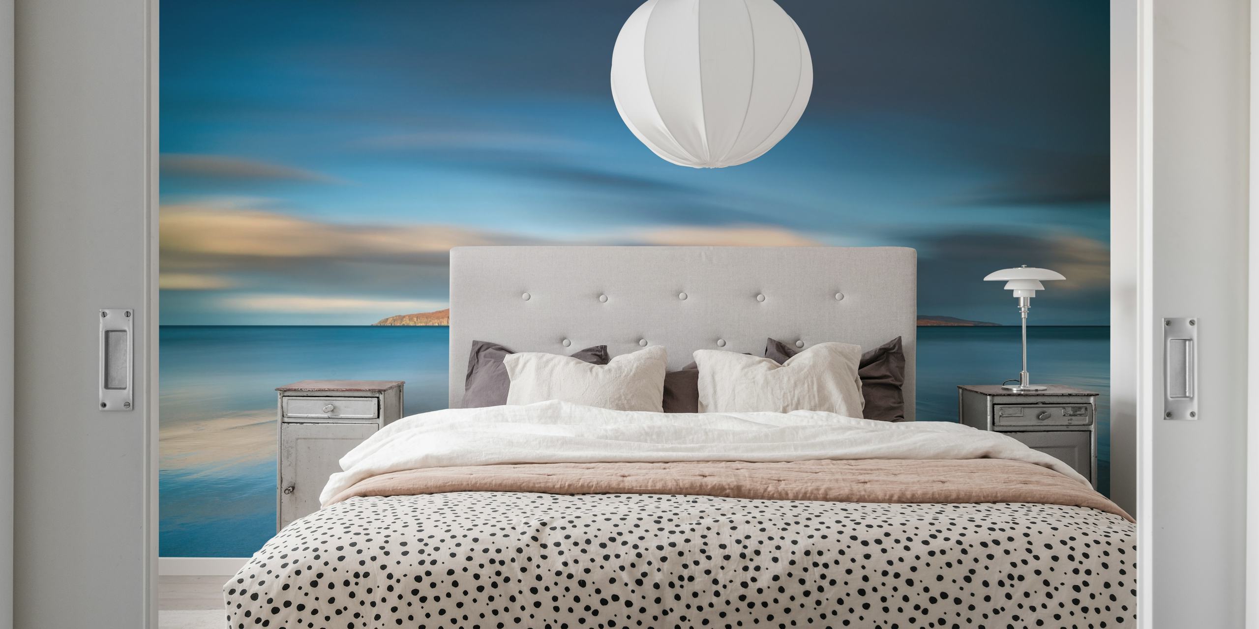 Epic sunrise over the ocean and island, blue tones wallpaper