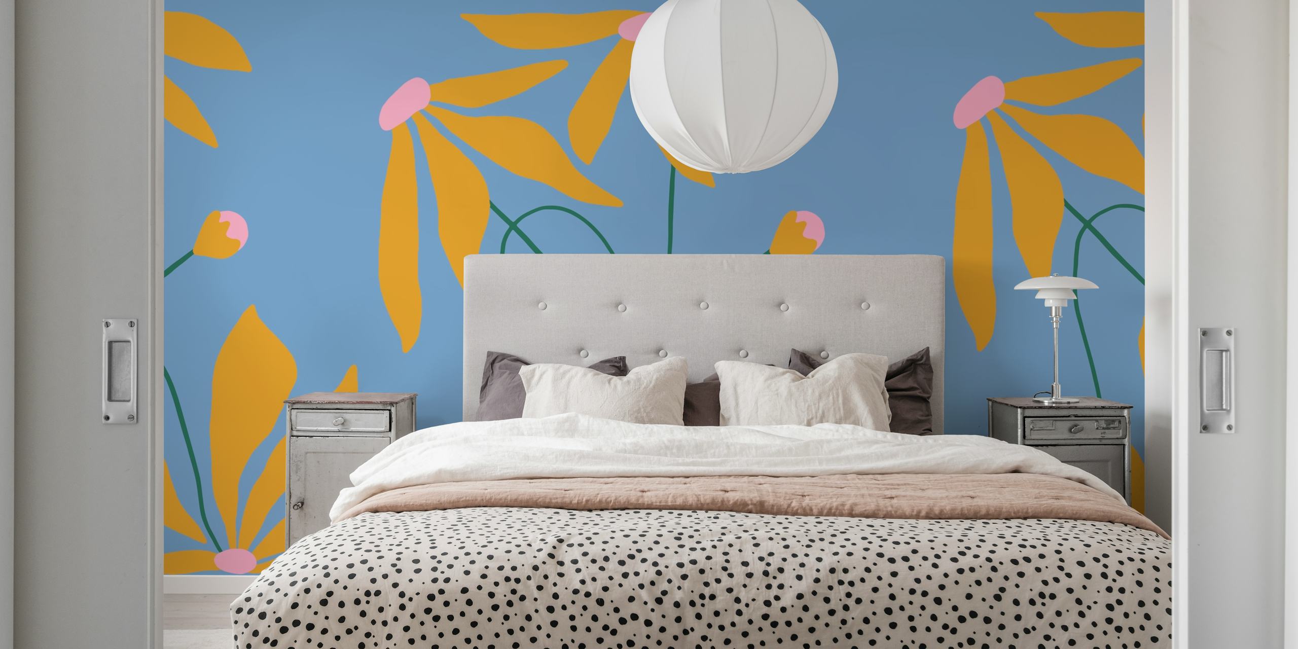 Colorful floral design with yellow petals and pink accents on blue wallpaper