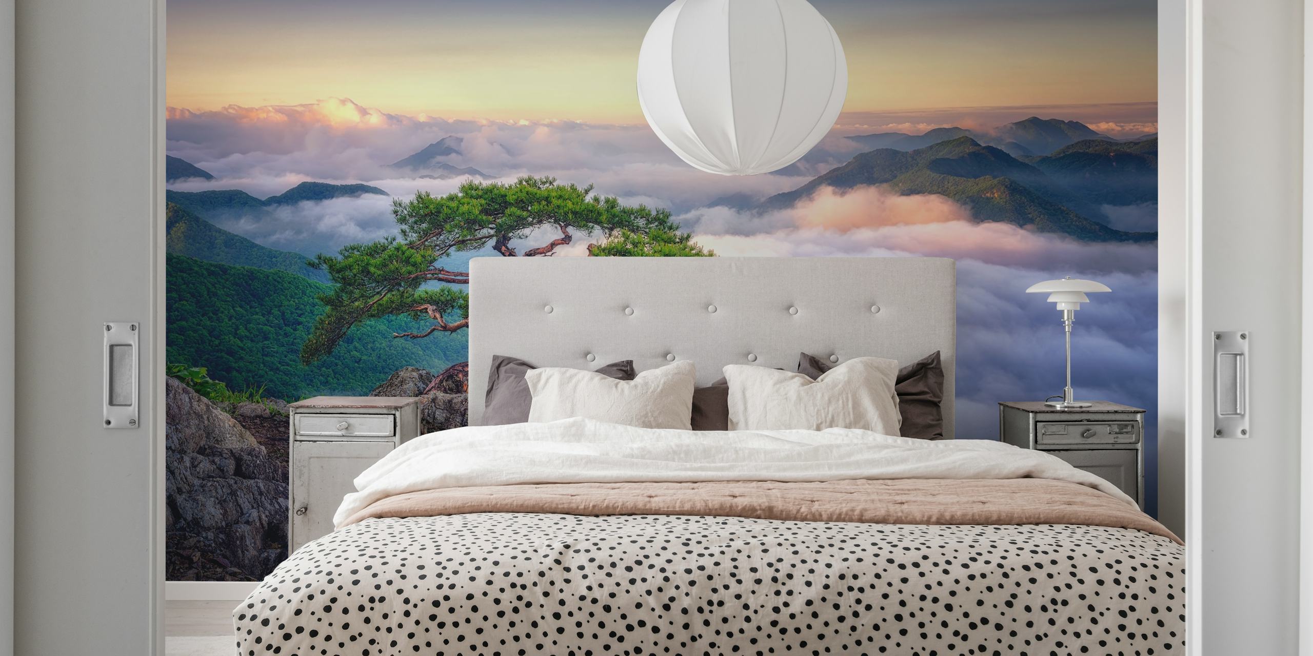 Wallpaper depicting a tree on rocky mountain peak