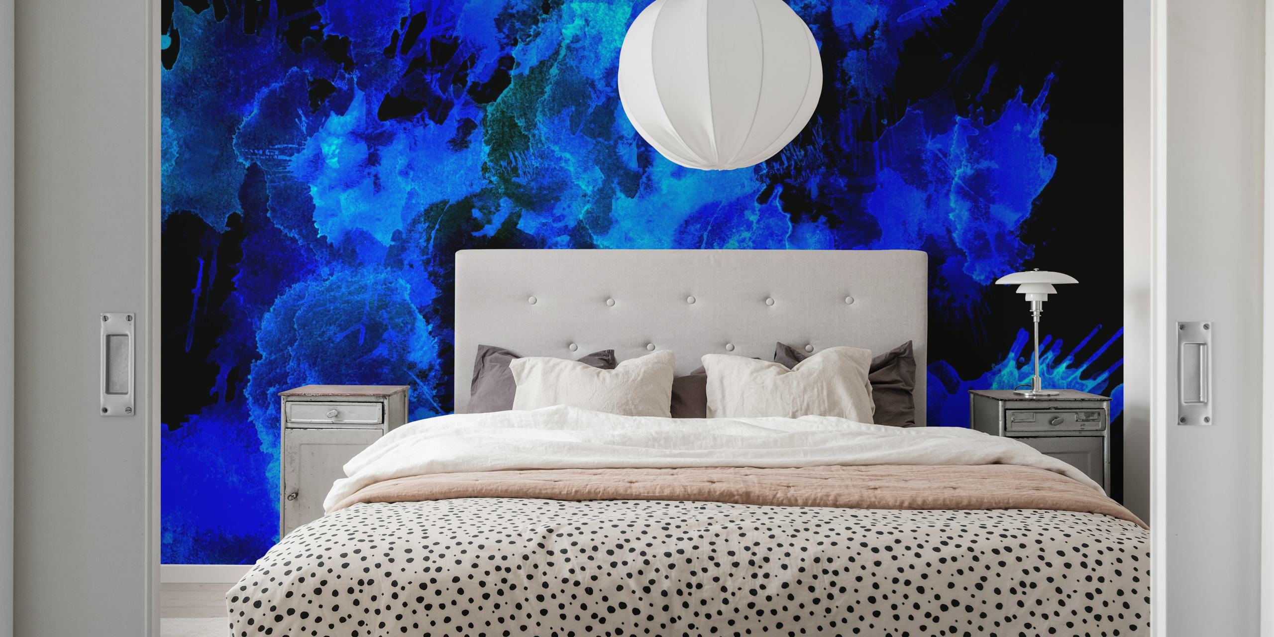 Abstract blue splash patterns on black wallpaper