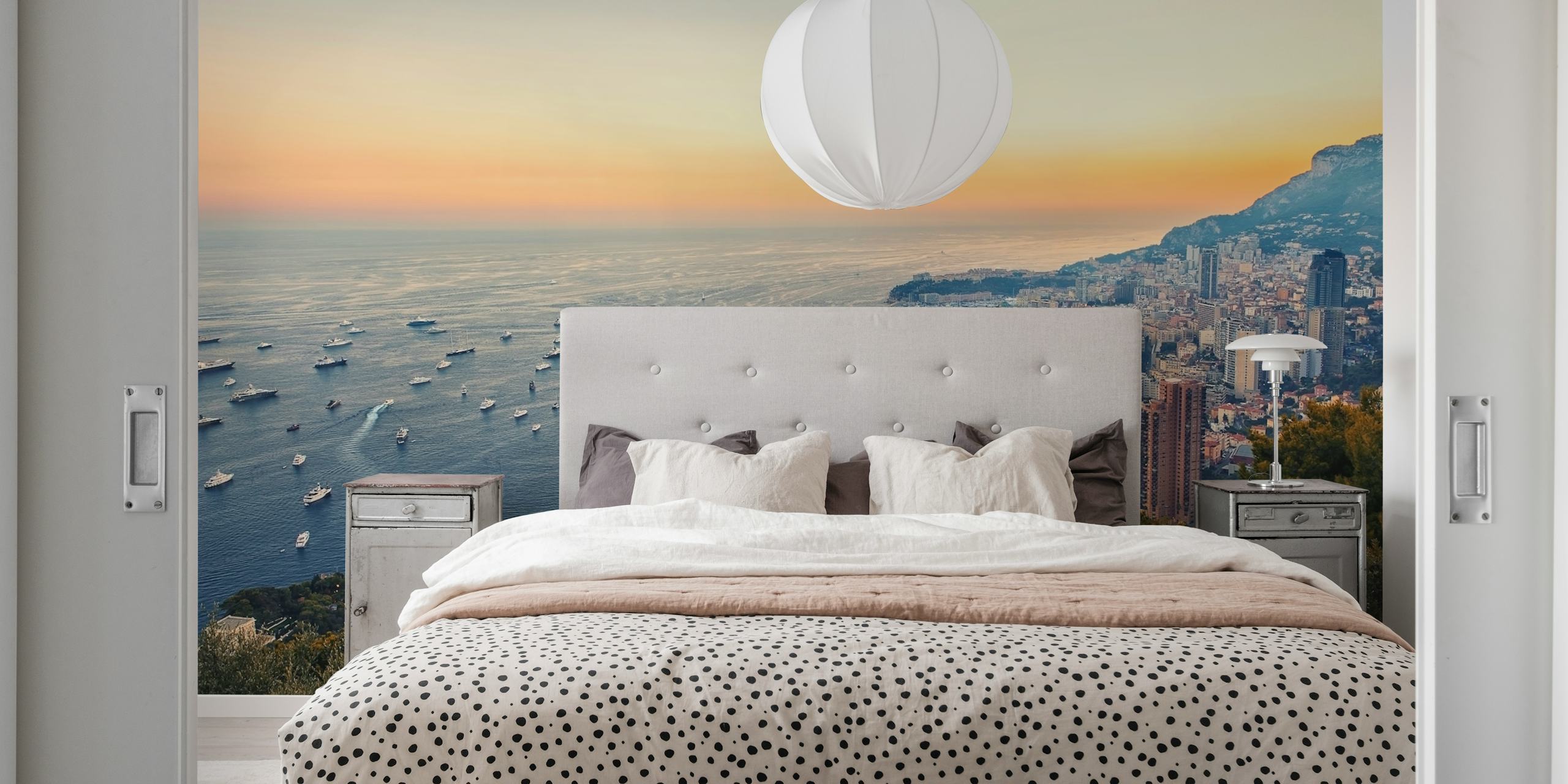 Coastal landscape wallpaper with boats and cliffs in soft blue and orange hues.
