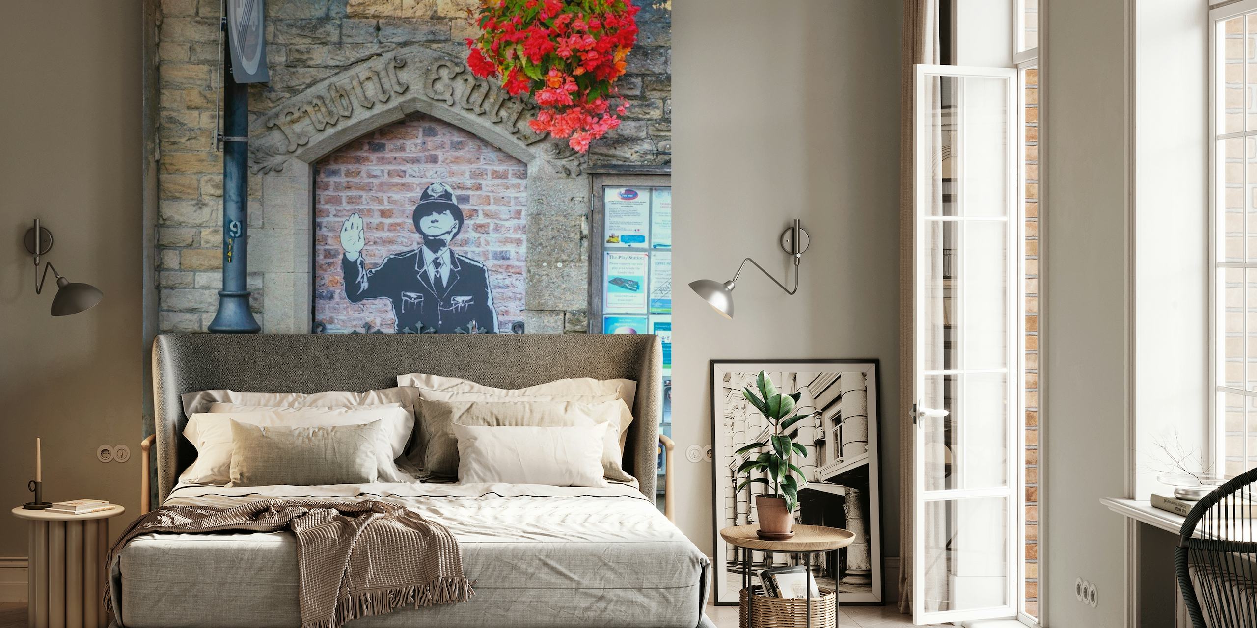 Cotswold village wall mural with a faux guard figure and floral accents