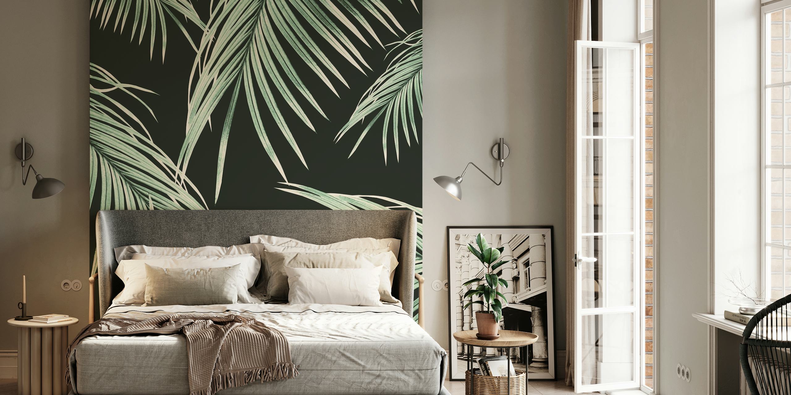 Green palm leaves on a dark background wall mural