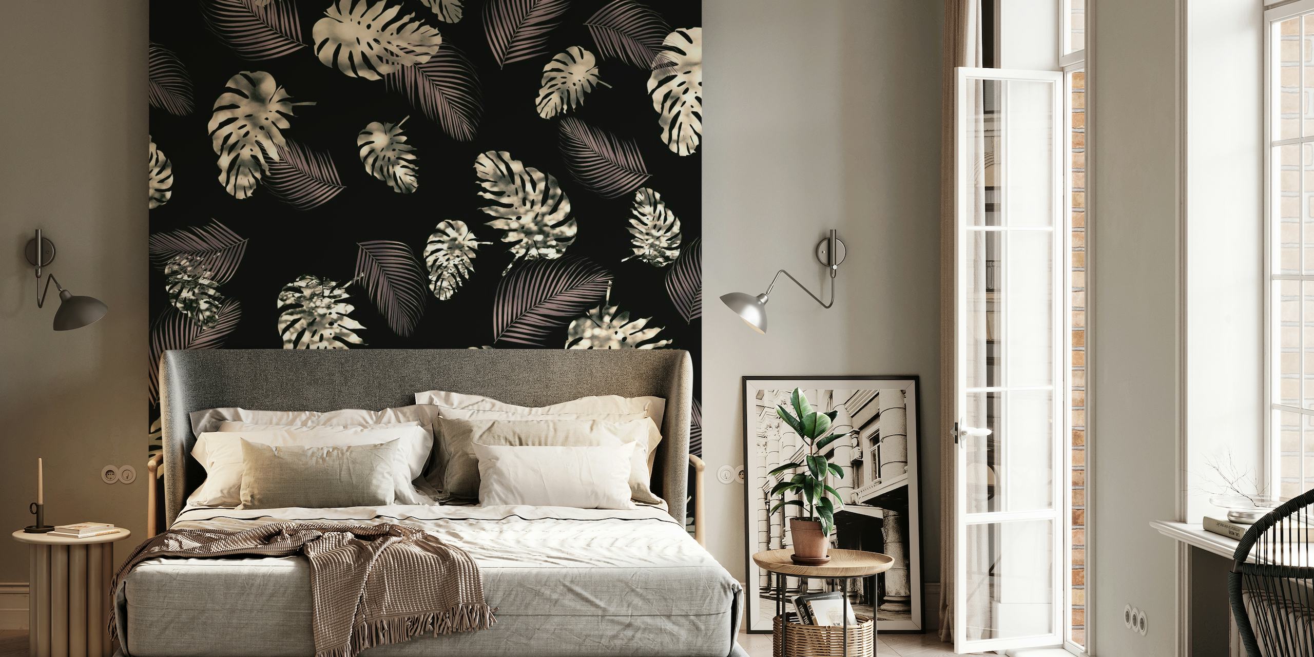 Tropical Monstera leaves pattern wall mural on a black background