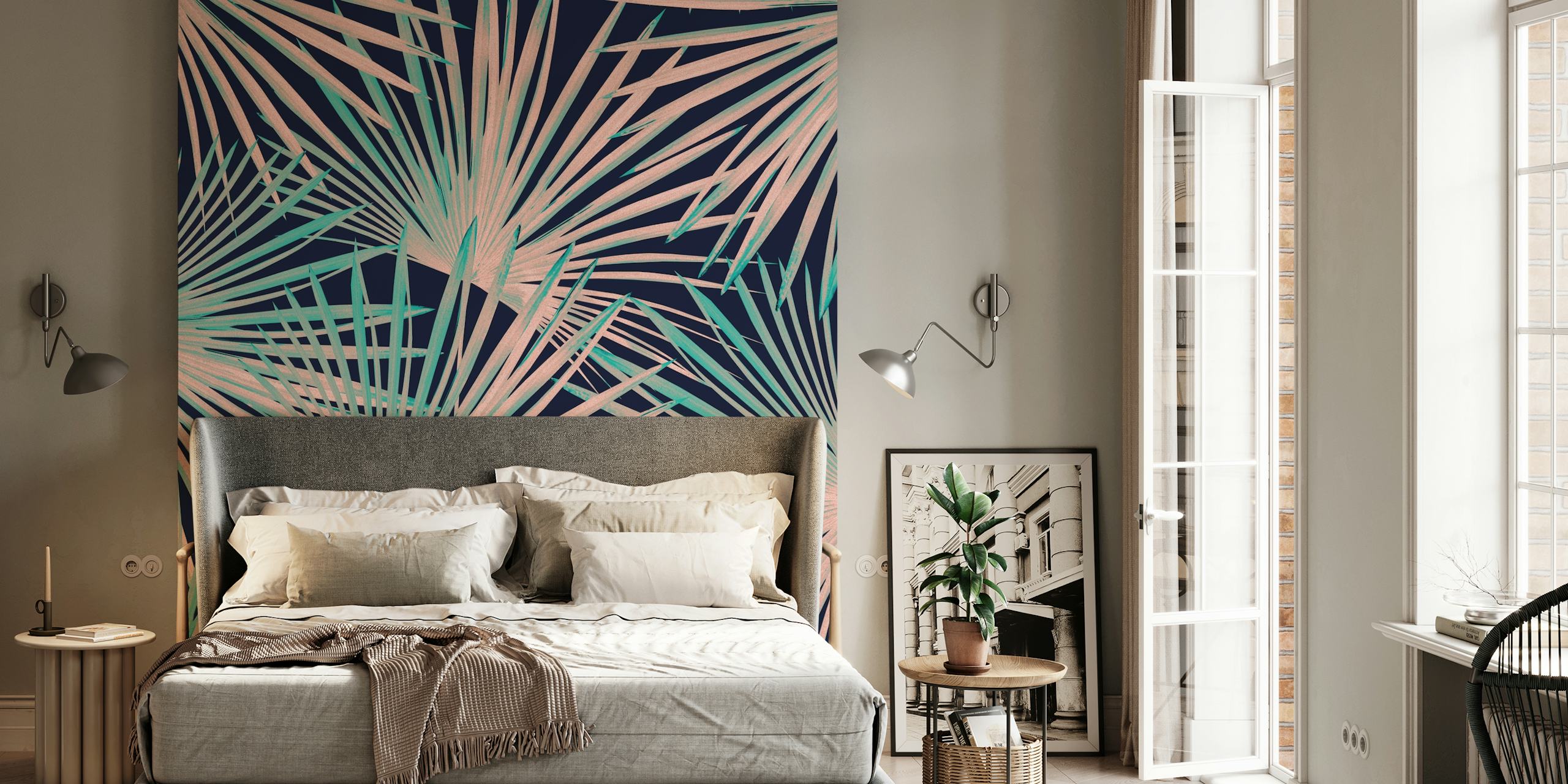 Tropical fan palm leaves in green and pink on a dark background wallpaper