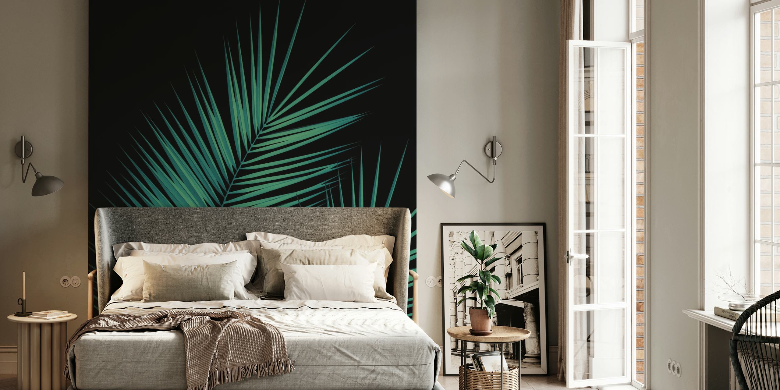 Tropical green palm leaves on a black background wallpaper