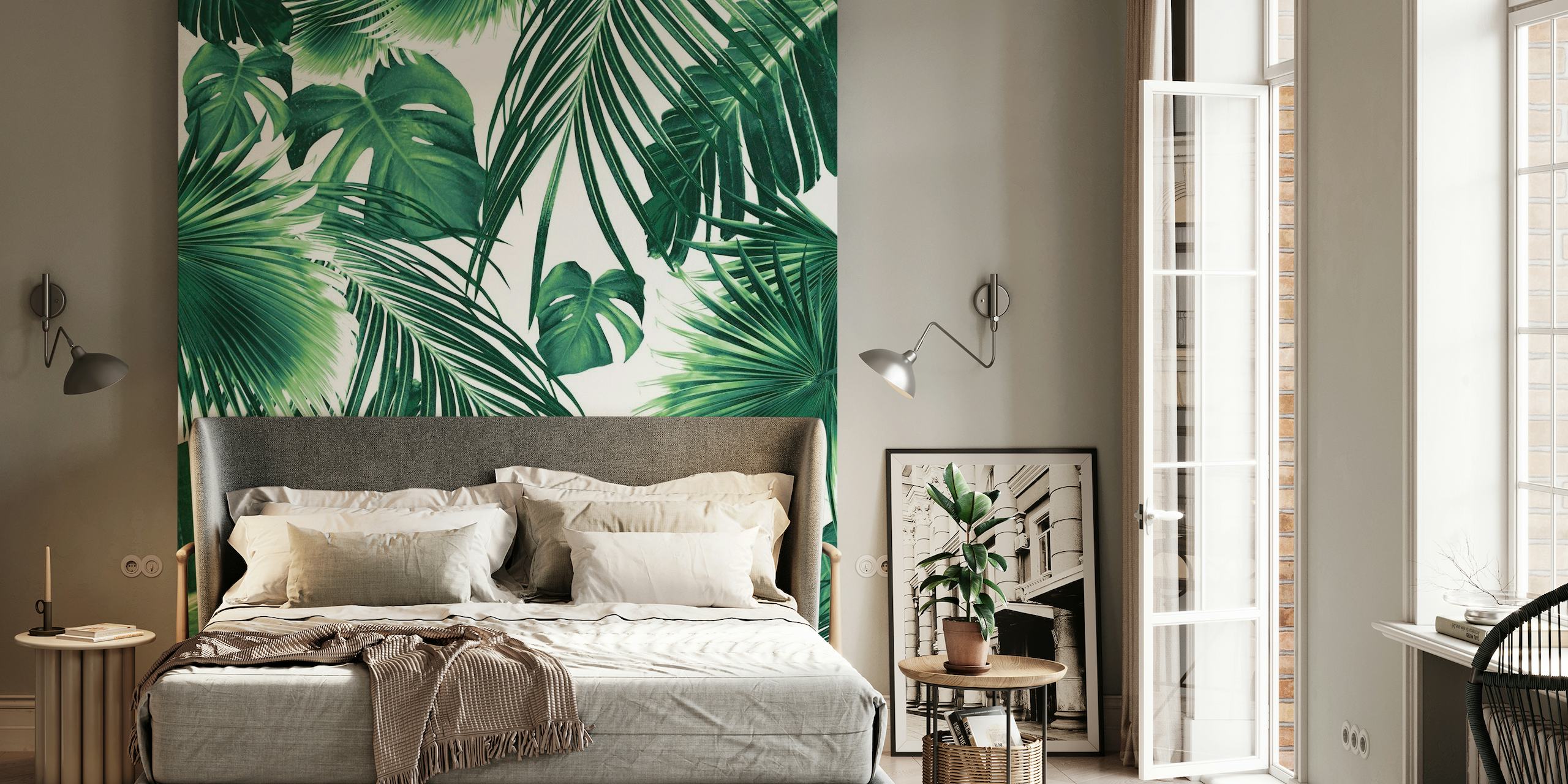 A lush wall mural with a dense pattern of tropical jungle leaves in shades of green