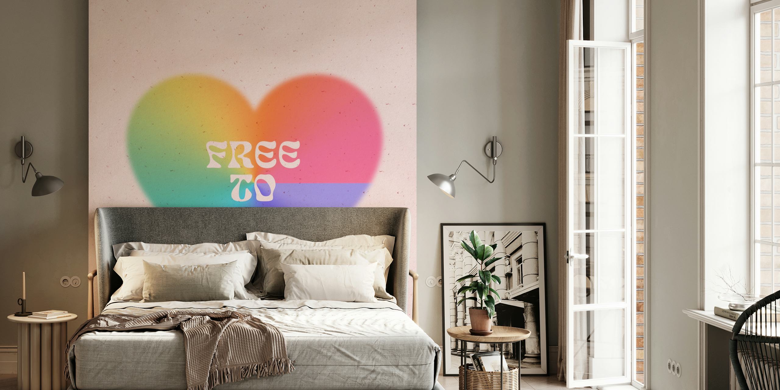 Rainbow heart wall mural with Free to Love text on a pastel background