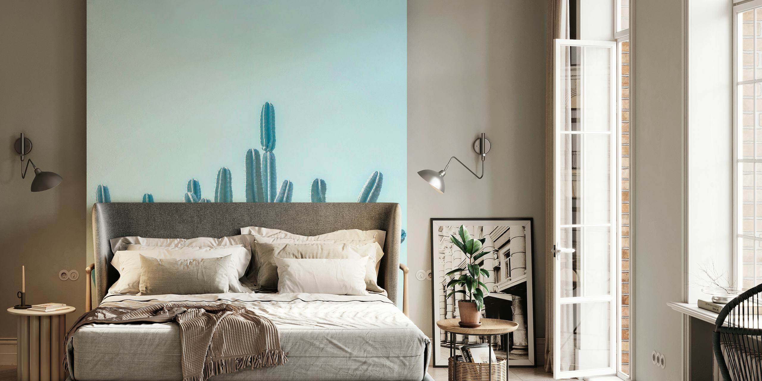 Minimalist cactus wall mural with clear blue sky background
