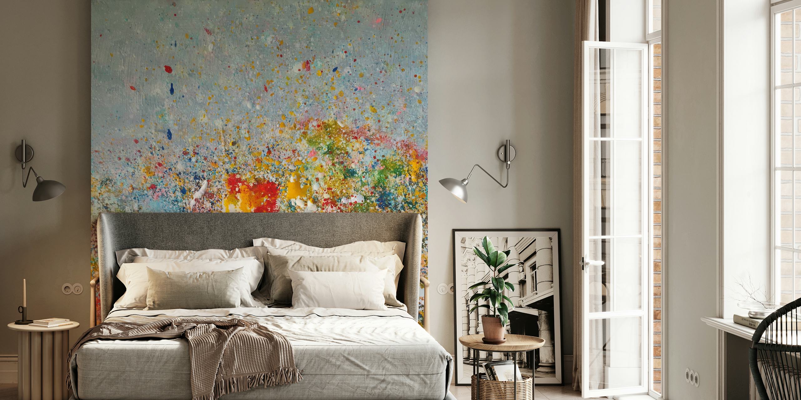 Colorful ink splashes in blue, pink, yellow, and green abstract wallpaper
