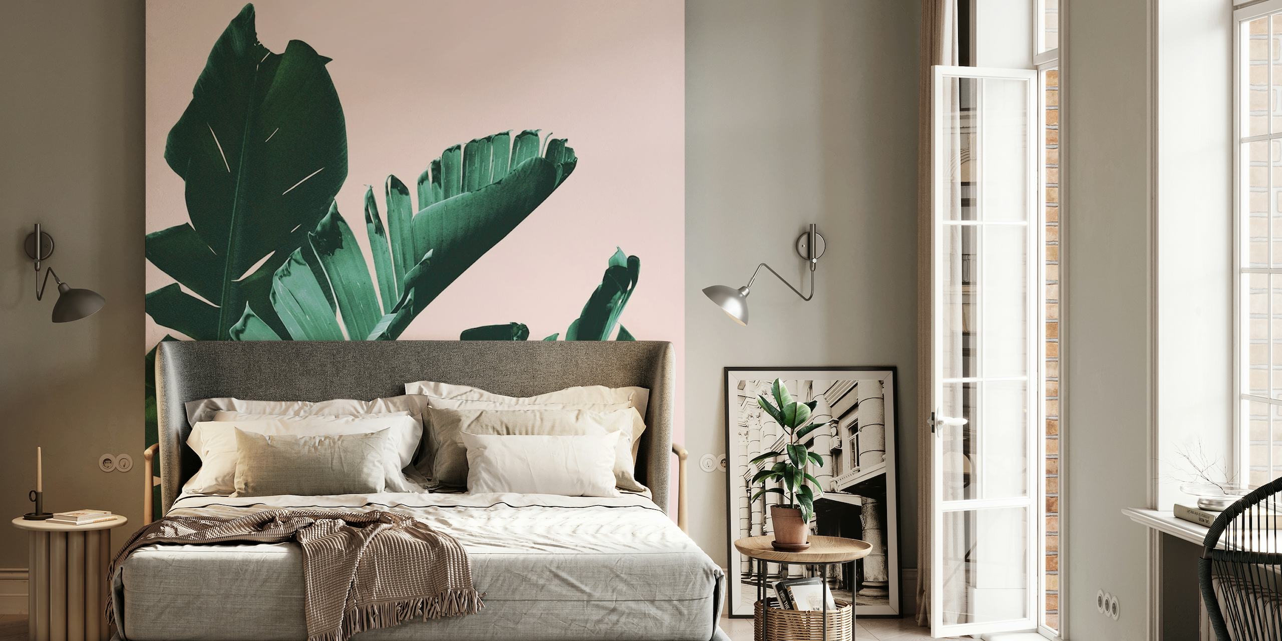 Artistic banana leaves wall mural with pink background