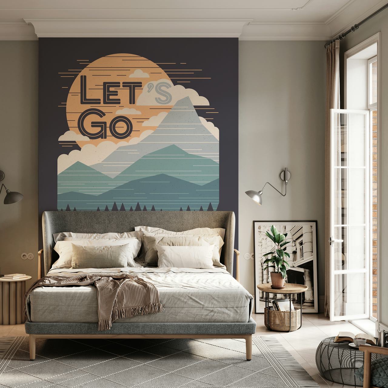 Havainnollistava seinämaalaus vuorilla, järvellä ja Let's Go -tekstillä vangitsemassa seikkailun henkeä