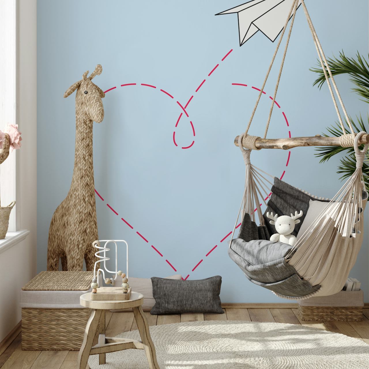 White paper airplane flying above a dashed heart outline on light blue wallpaper