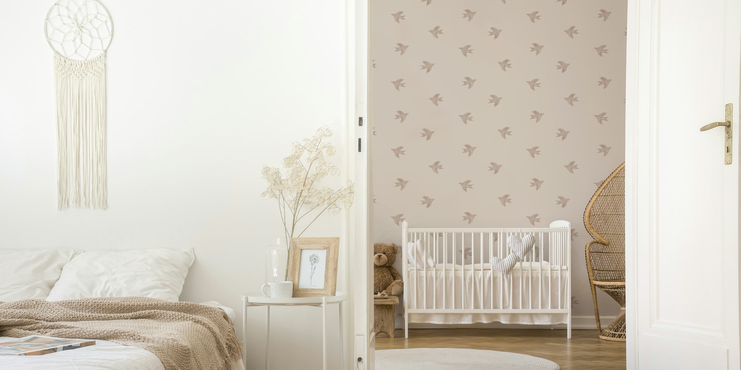 Shell pink wallpaper with small bird patterns in delicate shades.