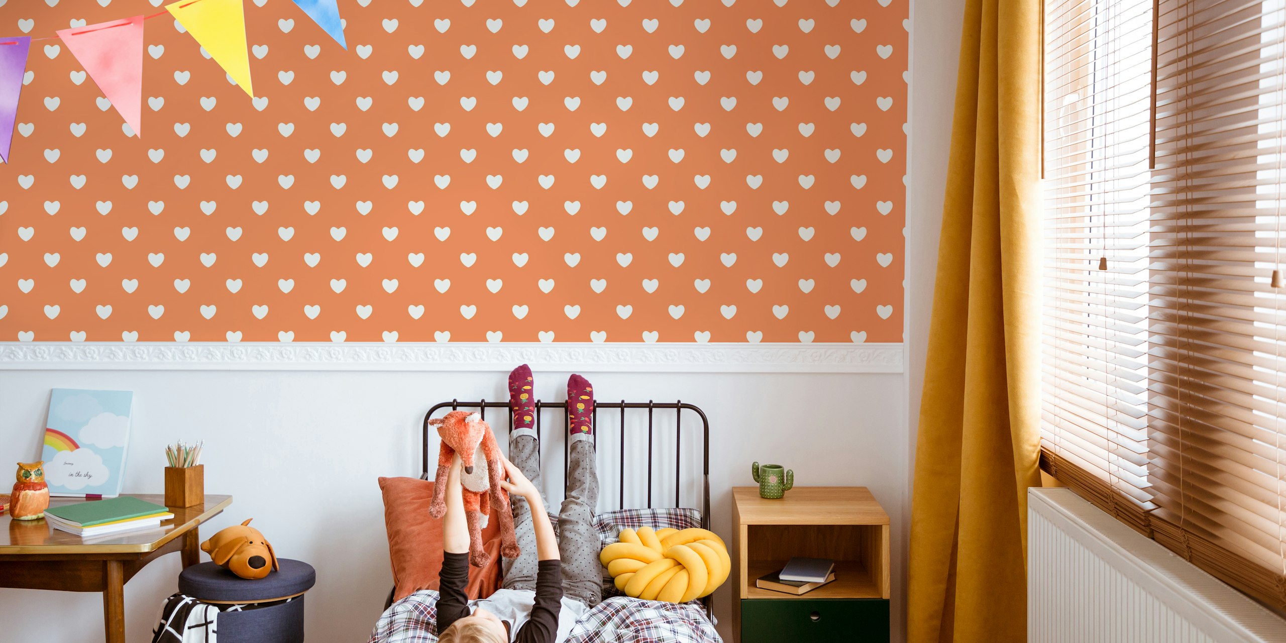 Hearts pattern wallpaper in a kids room