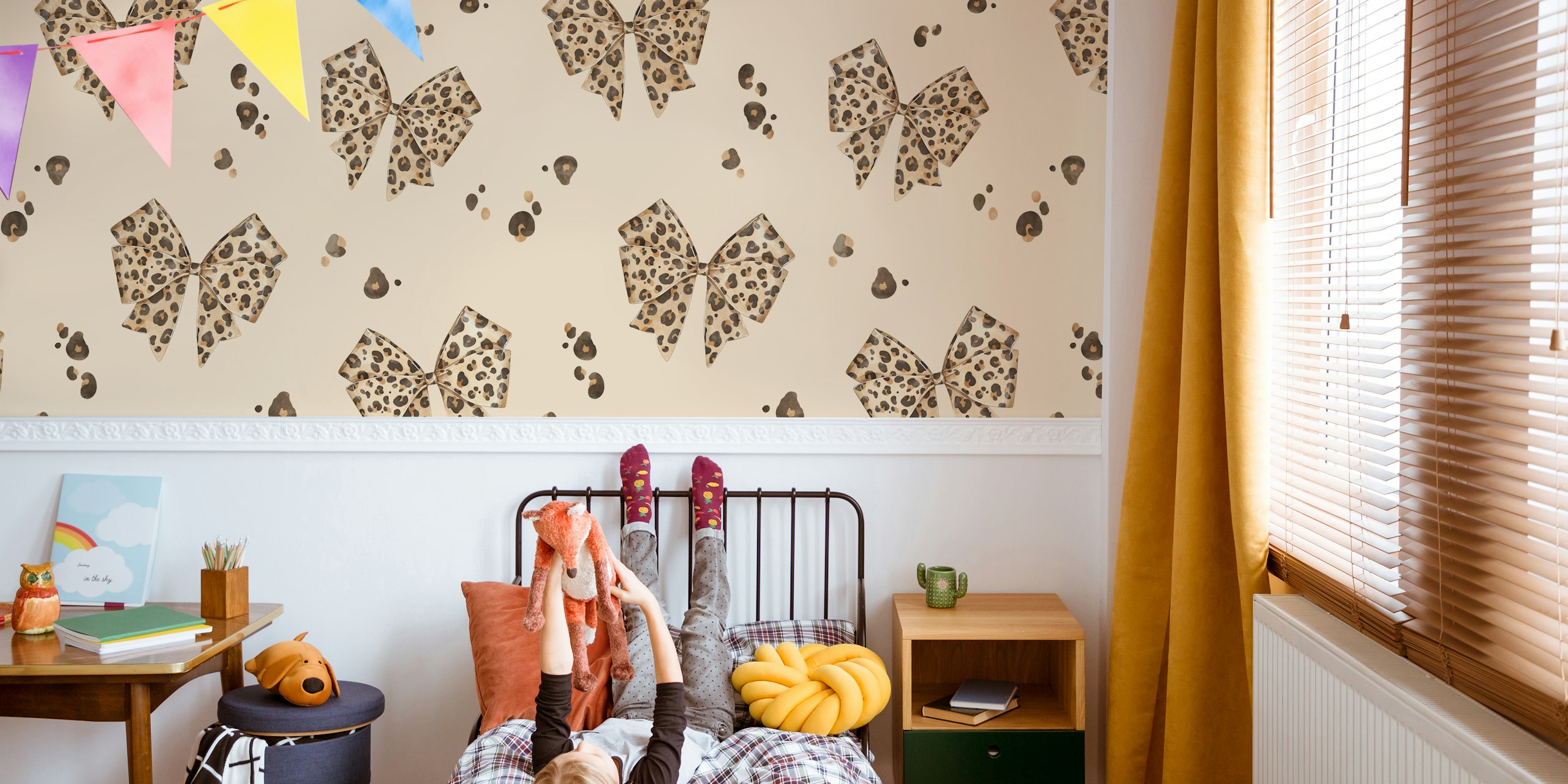 Beige wallpaper with leopard print bows and speckled patterns