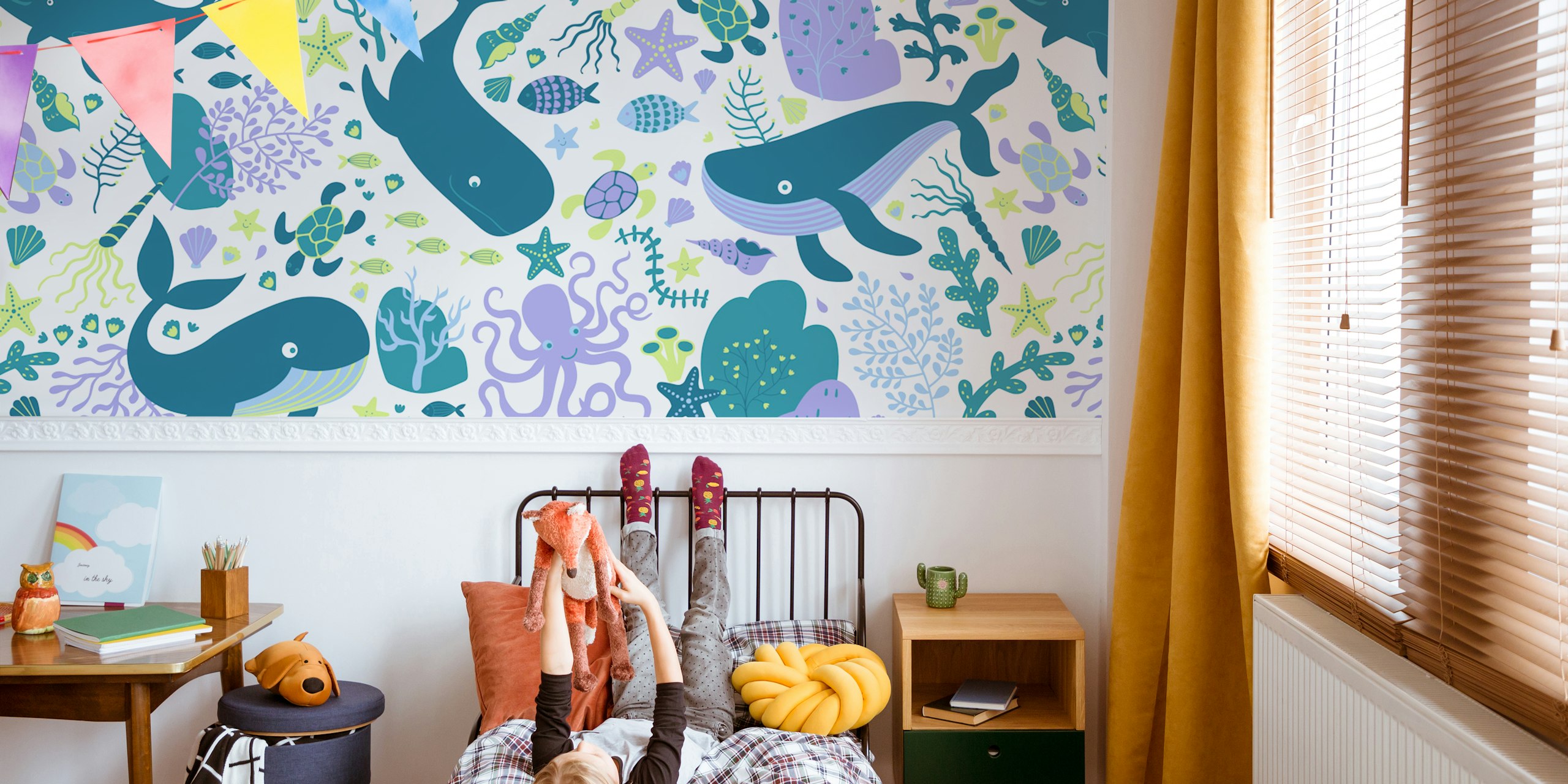 Whale and sea life patterns in blue and green wallpaper