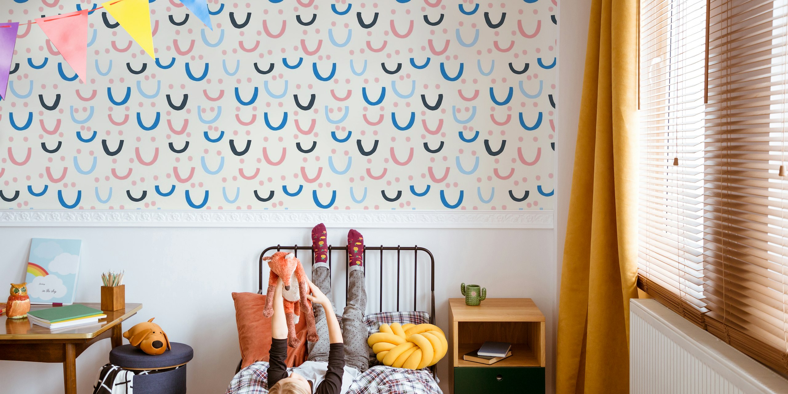 Smiling faces and polka dots pattern wall mural in pastel shades of pink and blue