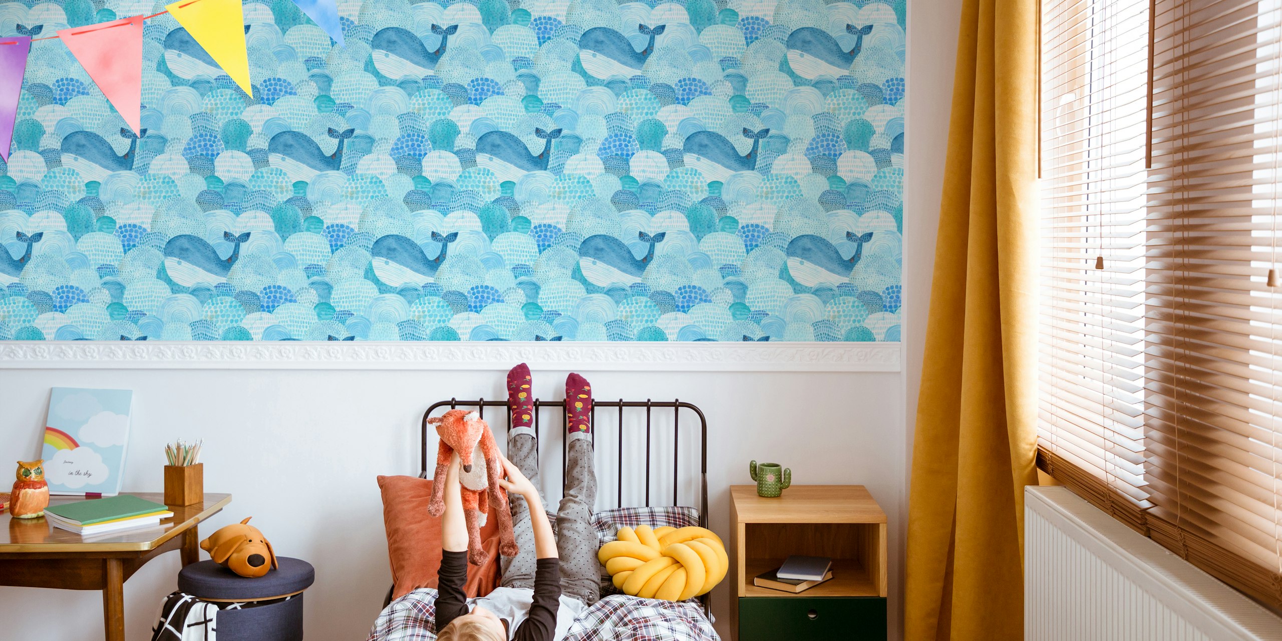 Whales swimming in blue waves with dotted patterns wallpaper