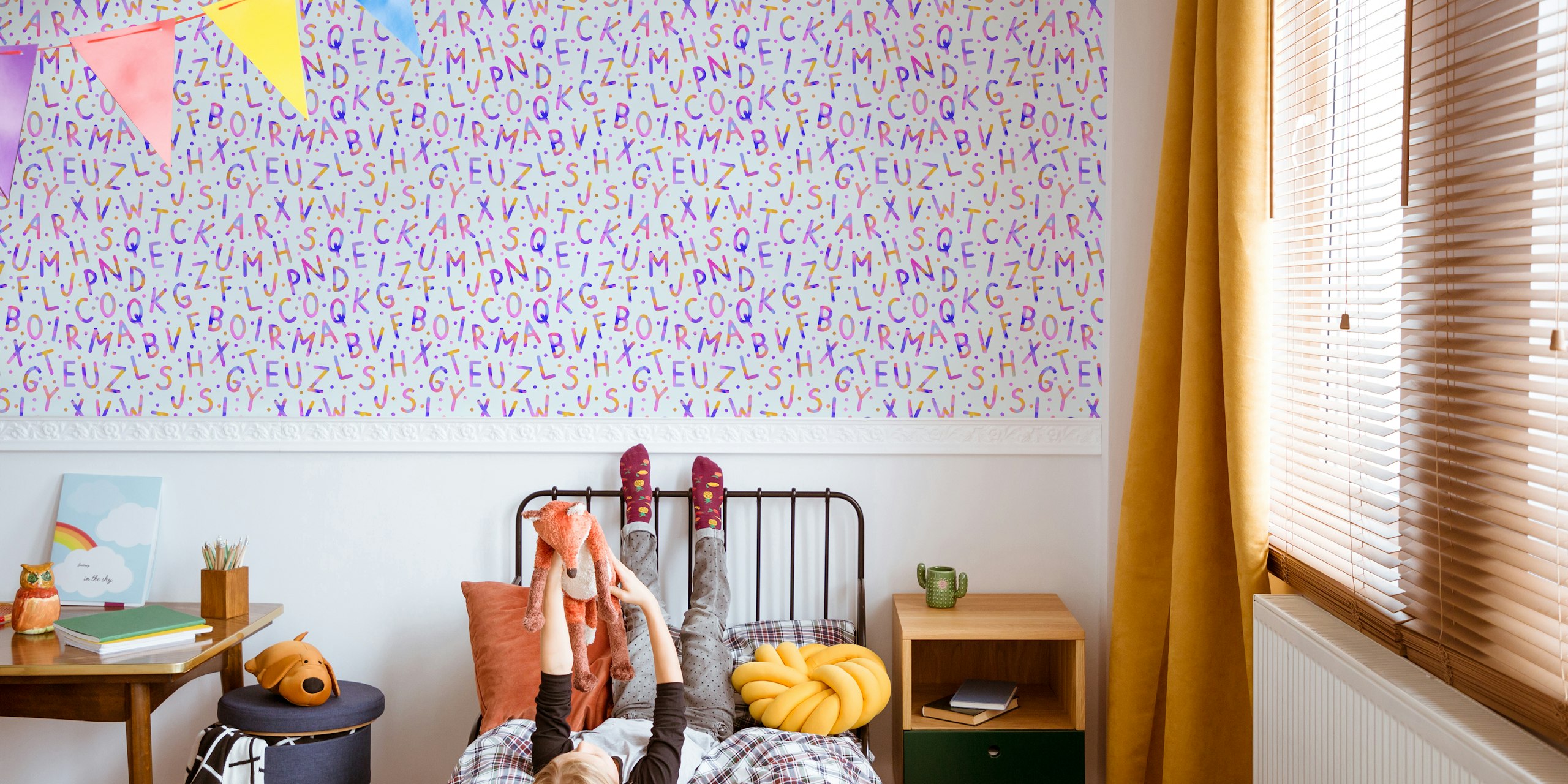 Rainbow alphabet wallpaper in a room