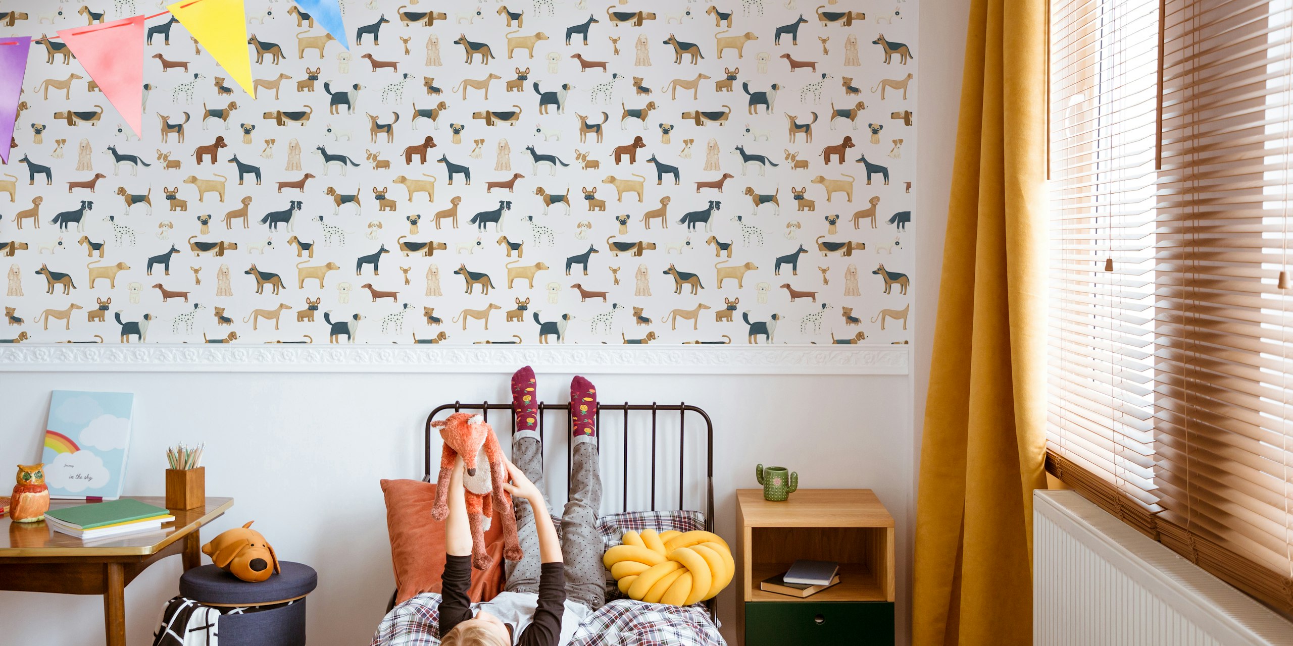 Various dog breeds illustrated on pale pink wallpaper