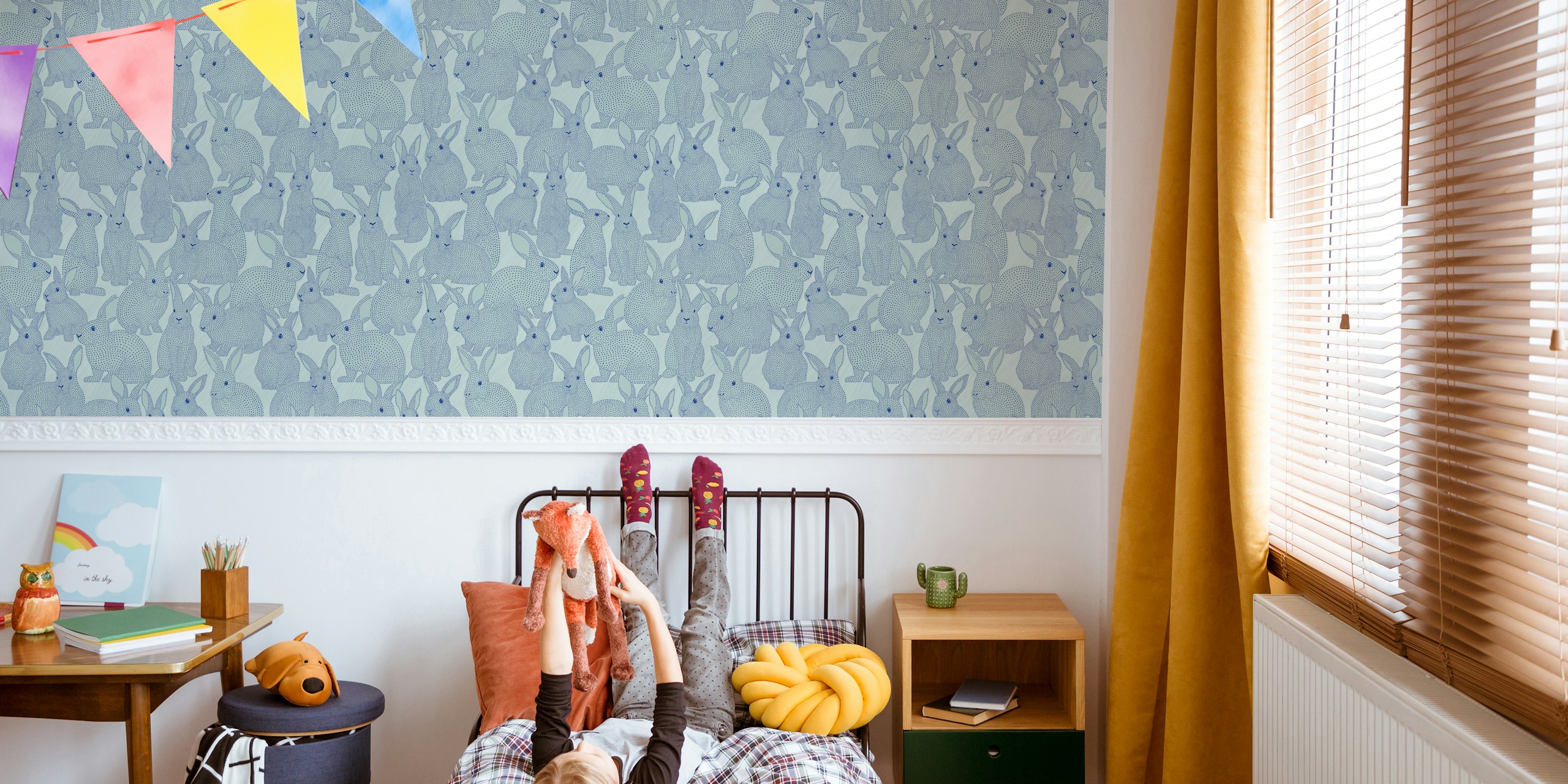 Dotted rabbits blue wallpaper in a room